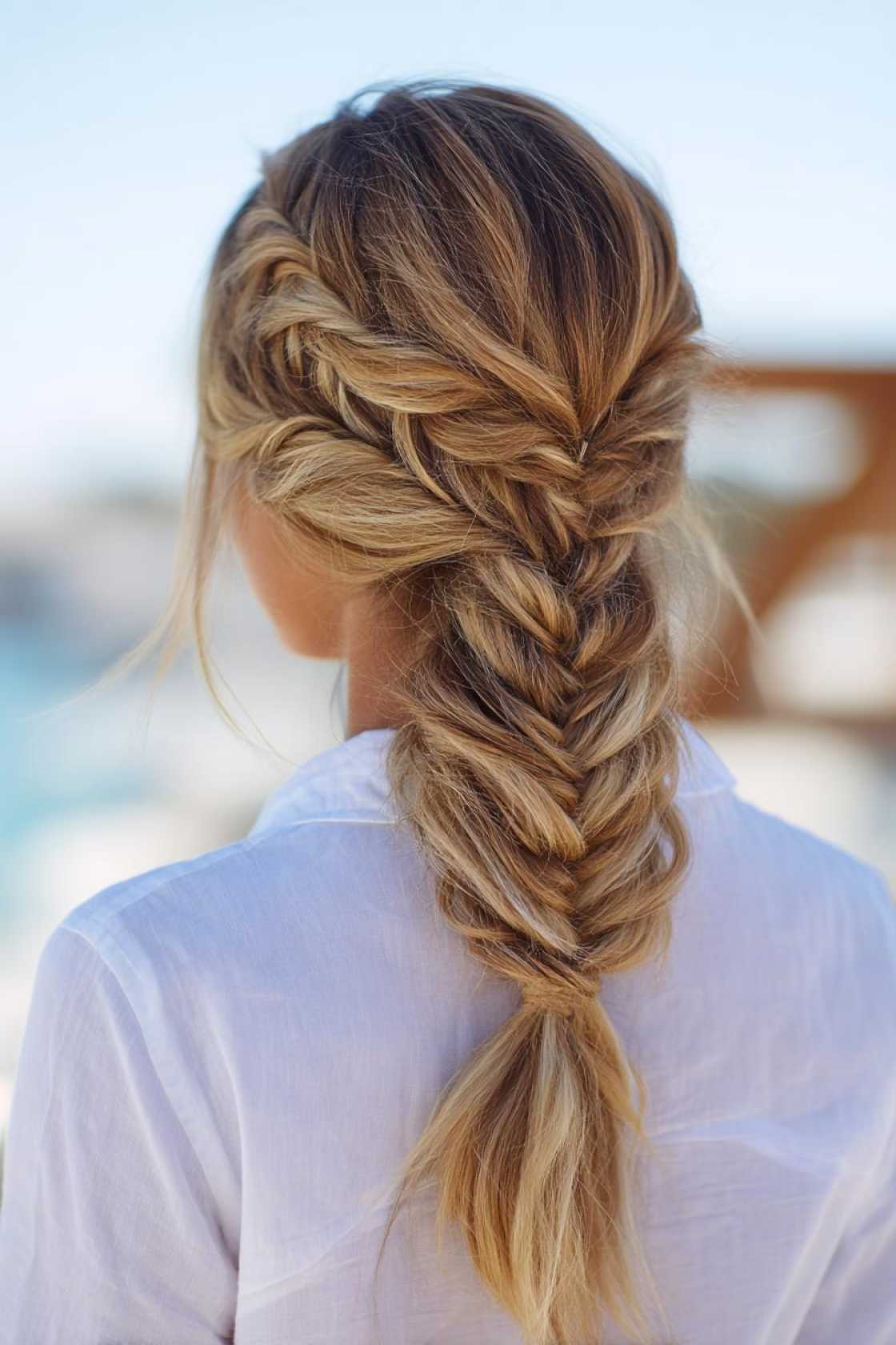 15+ Chic & Easy Hairstyles for the Beach (Waves, Braids, & Updos!). - 4. Fishtail Braid