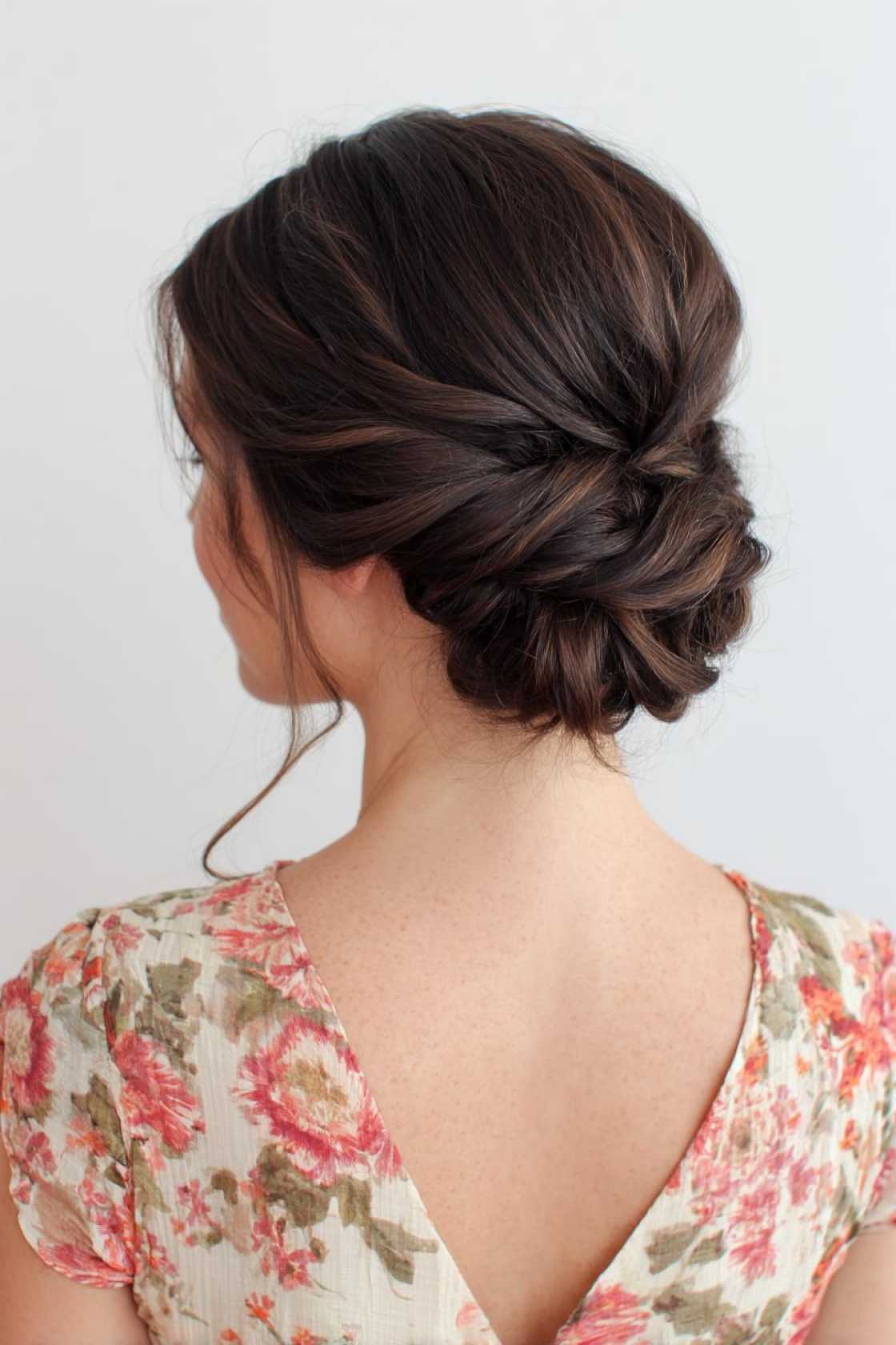 15+ Chic Summer Updos for Medium Hair (Easy Styles to Beat the Heat!). - 1. The Twisted Low Bun