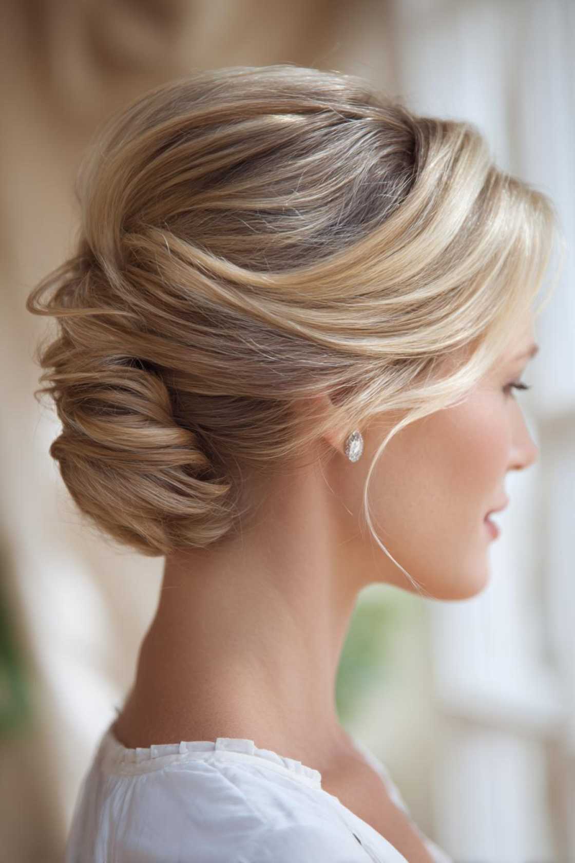 15+ Chic Summer Updos for Medium Hair (Easy Styles to Beat the Heat!). - 9. French Twist Classic