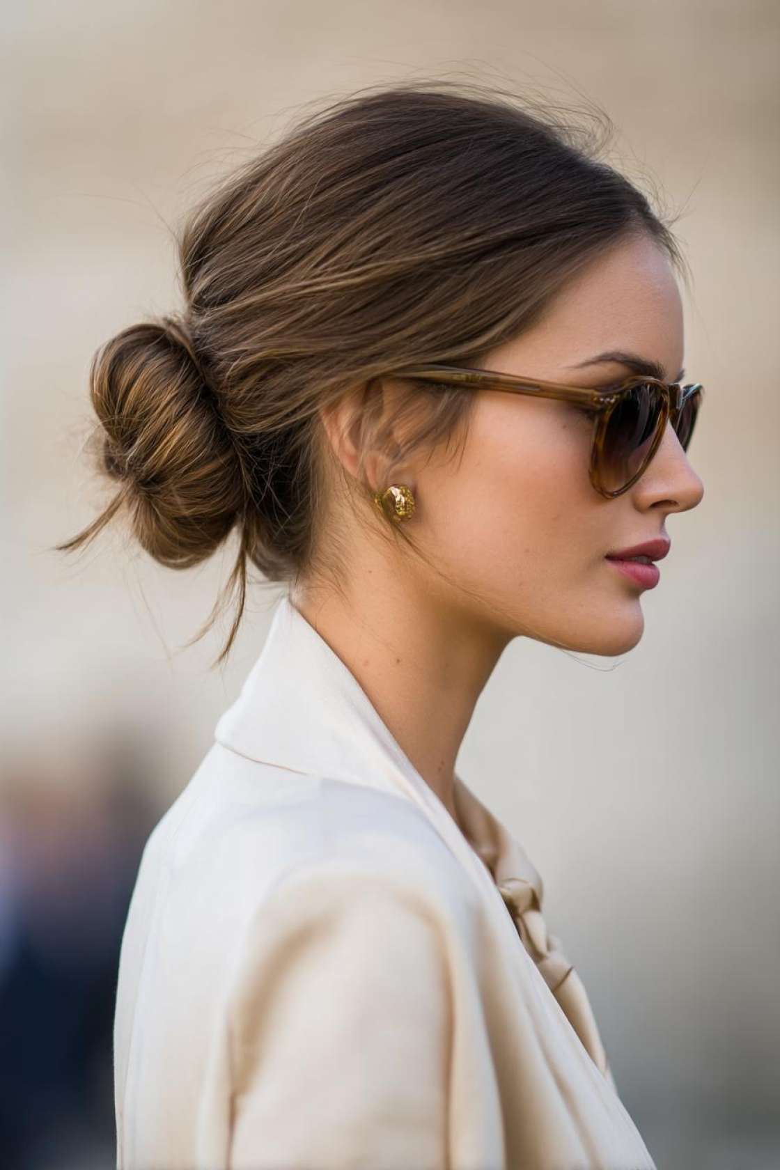 15+ Coolest Hot Weather Hairstyles to Beat the Heat (Updos, Braids & More!). - 16. Low Bun