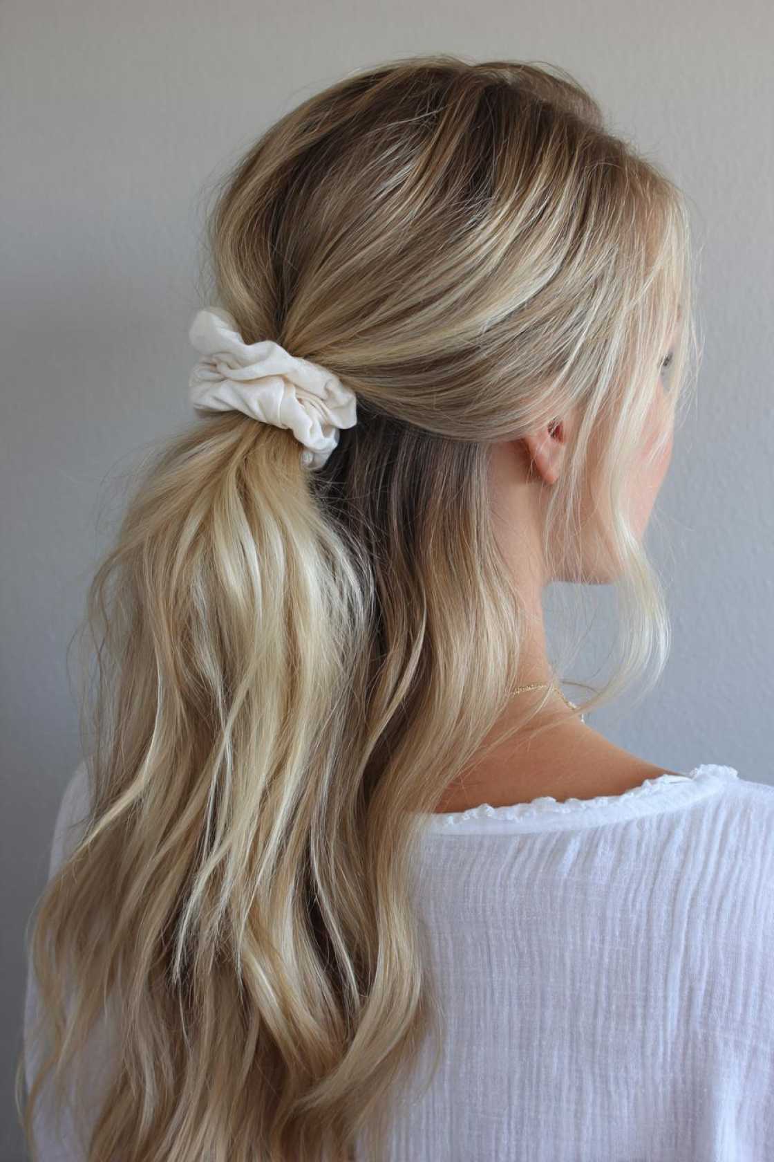15+ Effortless Beach Hairstyles: Salty Waves, Chic Braids & Easy Updos. - 8. Messy Half-Up Ponytail