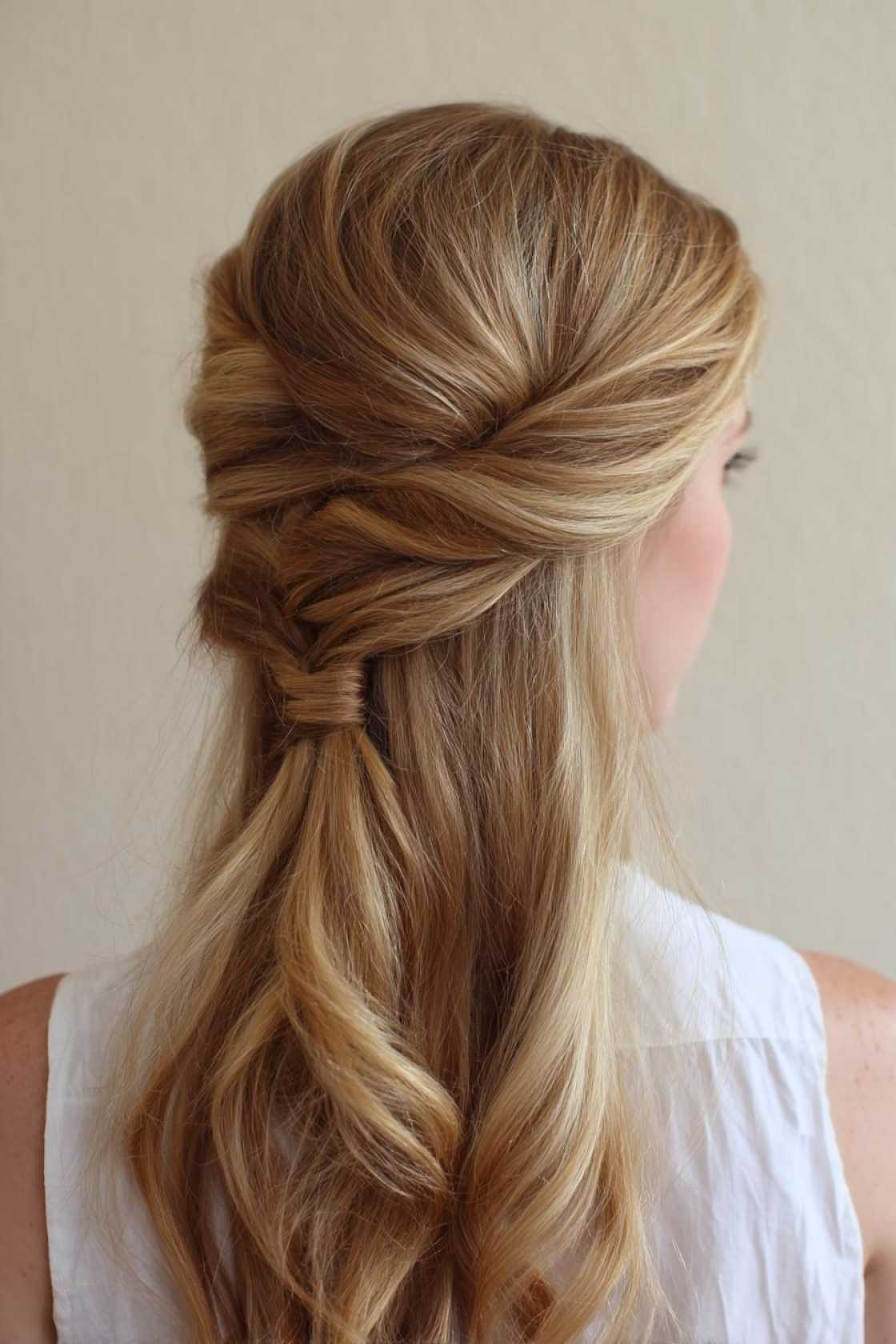 15+ Effortless Beach Hairstyles: Salty Waves, Chic Braids & Easy Updos. - 21. Twisted Half-Up