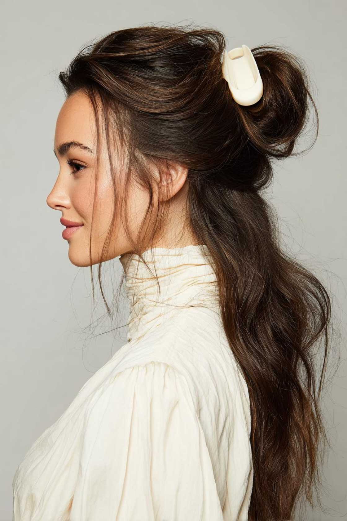15+ Effortlessly Chic Messy Claw Clip Hairstyles You Can Do in Seconds! - 13. The French Twist Base