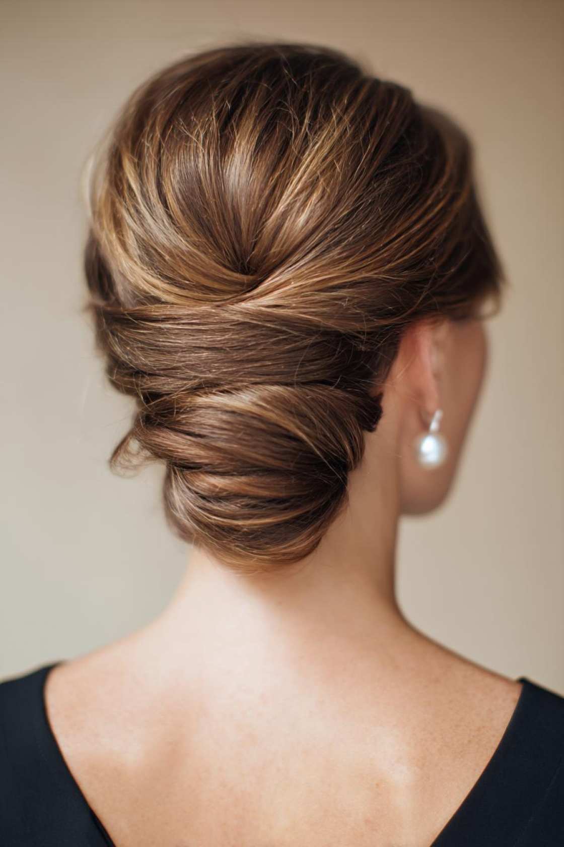 15+ Elegant Mother of the Groom Hairstyles for a Truly Special Day (All Hair Lengths). - 13. Elegant French Twist