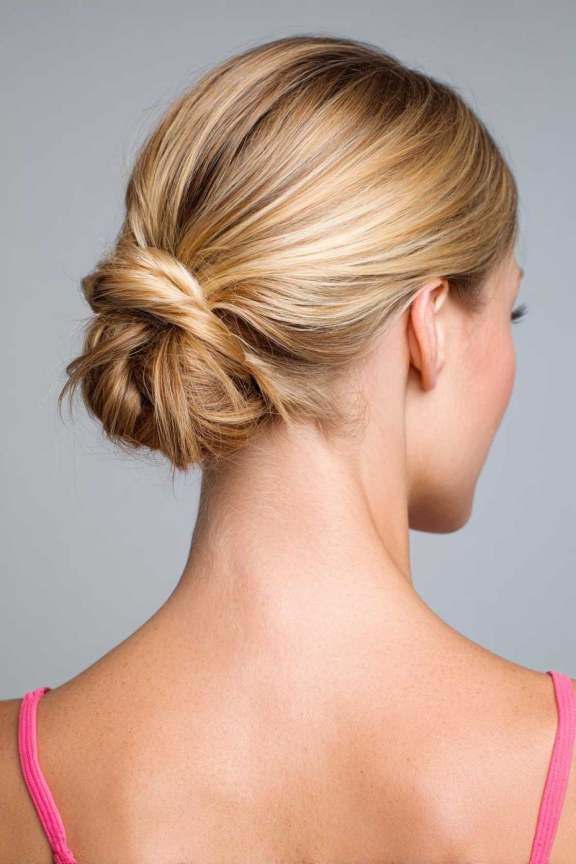 15+ Flip-Proof Gymnastics Hairstyles: Secure Buns, Braids & Tips for a Perfect 10 Look! - 16. Simple Low Bun