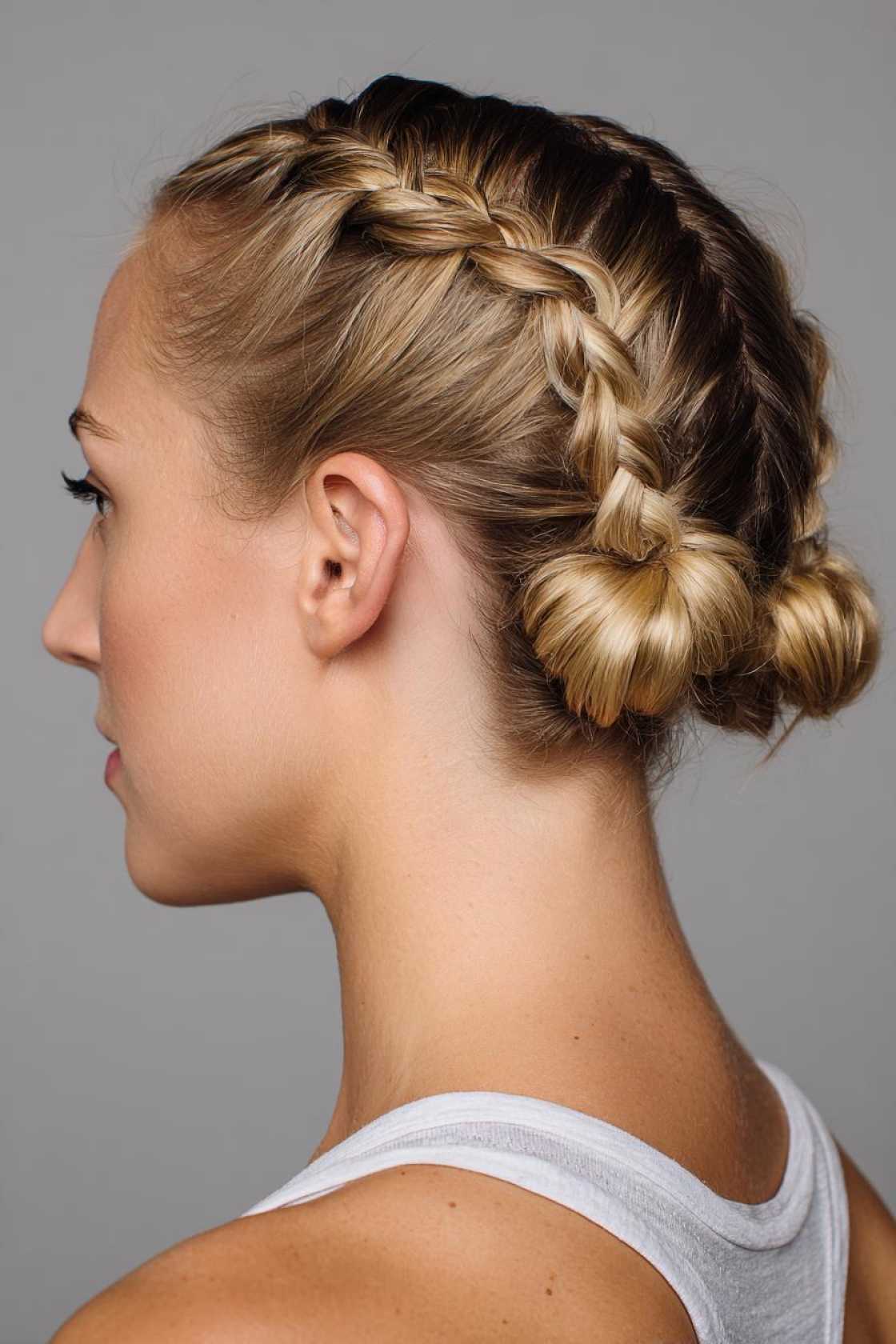 15+ Flip-Proof Gymnastics Hairstyles: Secure Buns, Braids & Tips for a Perfect 10 Look! - 15. Double French Braids to Buns