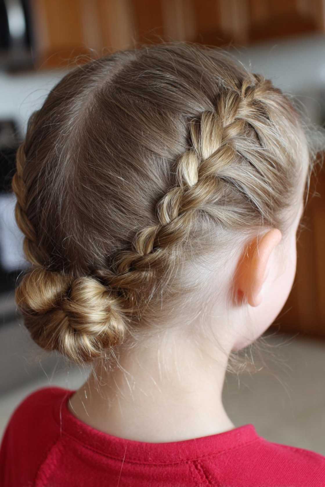 15+ Flip-Proof Gymnastics Hairstyles: Secure Buns, Braids & Tips for a Perfect 10 Look! - 10. Low Braided Buns