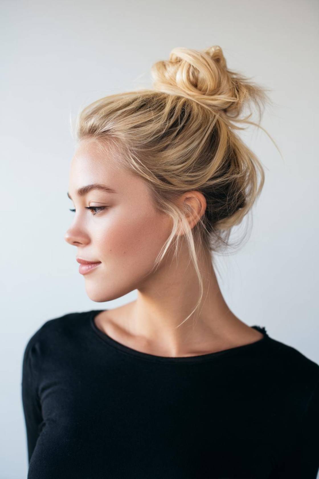 15+ Game-Winning Basketball Hairstyles: Secure Braids, Buns & Ponytails for the Court. - High Bun