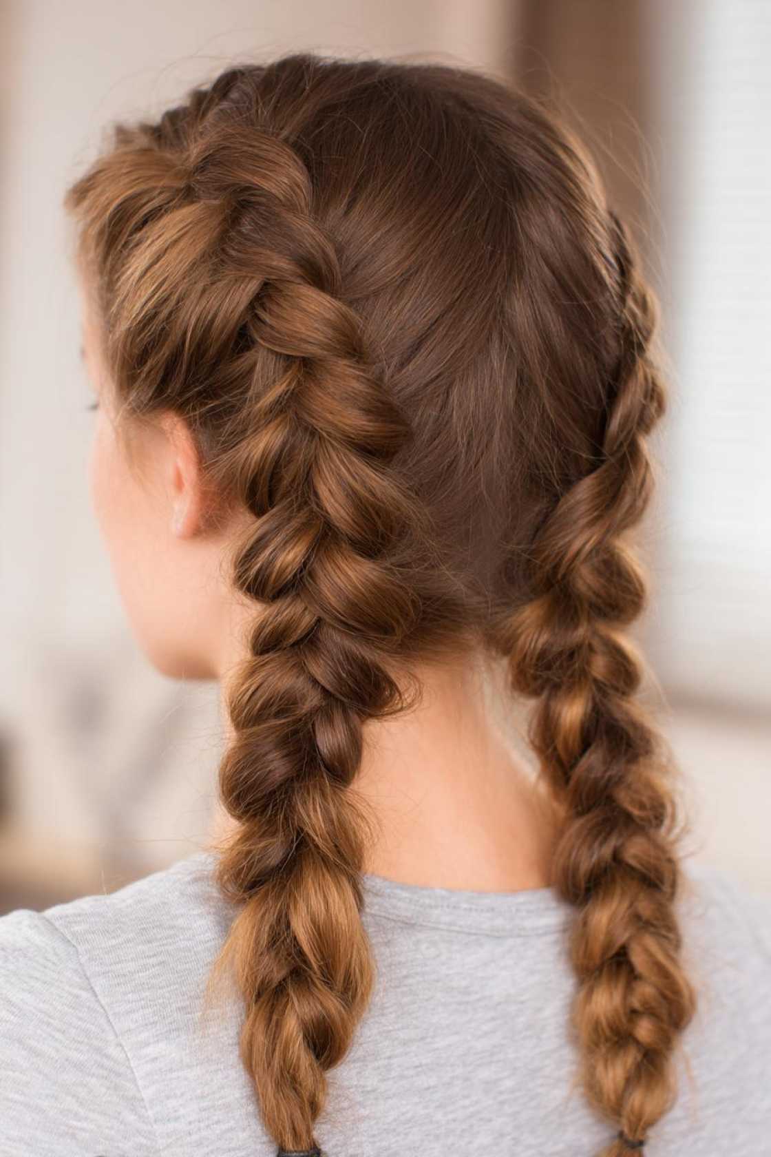 15+ Game-Winning Basketball Hairstyles: Secure Braids, Buns & Ponytails for the Court. - Two Dutch Braids