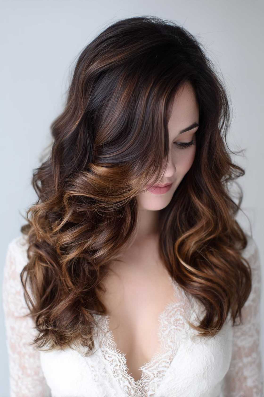 15+ Hottest Hoco Hair Ideas to Slay Your Homecoming Look (Curls, Updos & More!). - 13. Romantic Loose Curls