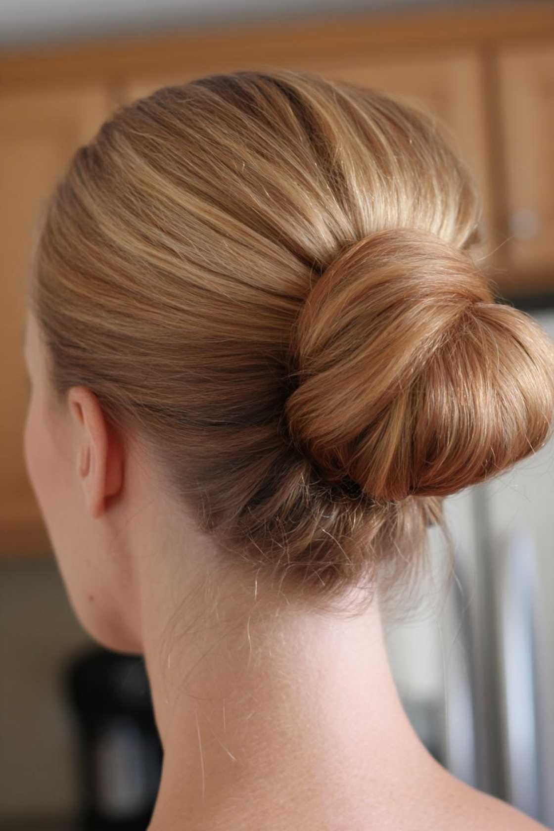 15+ Neat & Secure Waitress Hairstyles That Last Your Entire Shift (Food Service Approved!). - 3. Sock Bun