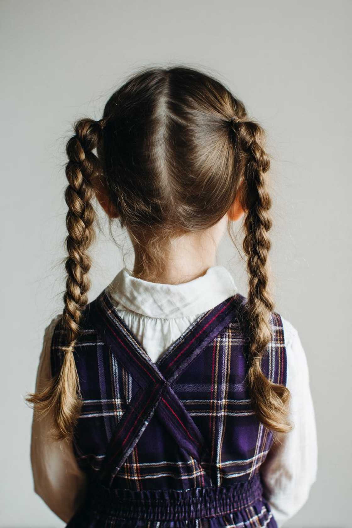 15+ Perfect First Day of School Hairstyles to Make a Great Impression (Easy & Cute!). - 4. Braided Pigtails