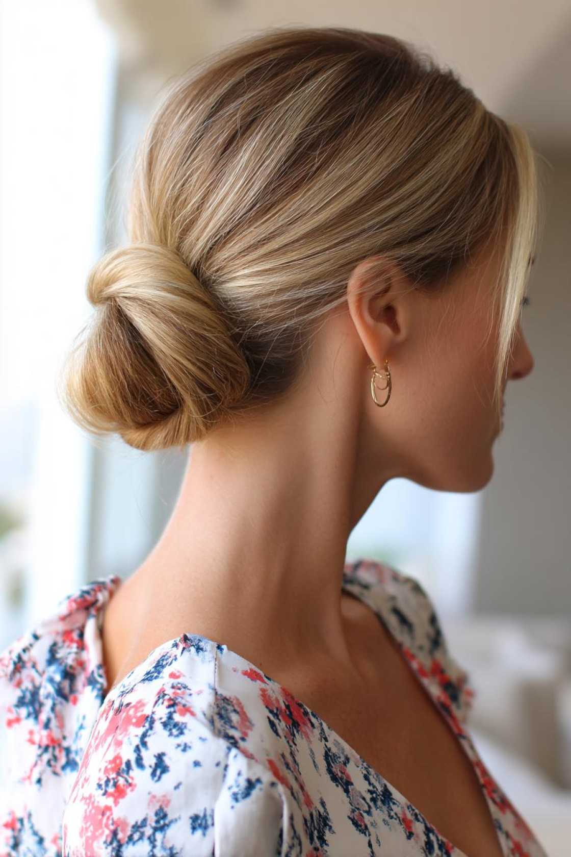 15+ Perfect First Day of School Hairstyles to Make a Great Impression (Easy & Cute!). - 12. Low Bun with Side Part