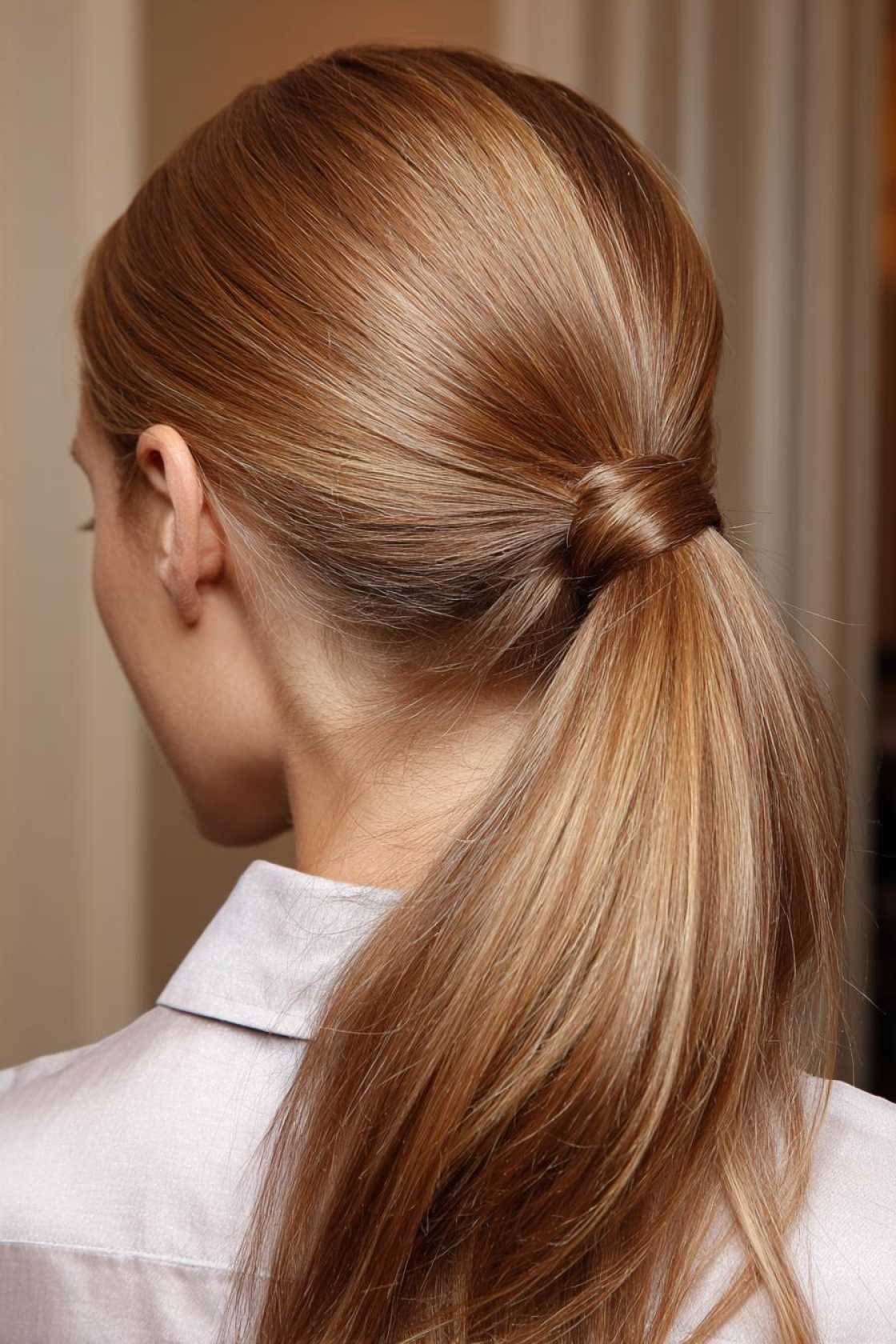 15+ Show-Stopping-Party-Pony-Hairstyles-to-Elevate-Your-Next-Night-Out.-7.-The-Wrapped-Base-Pony