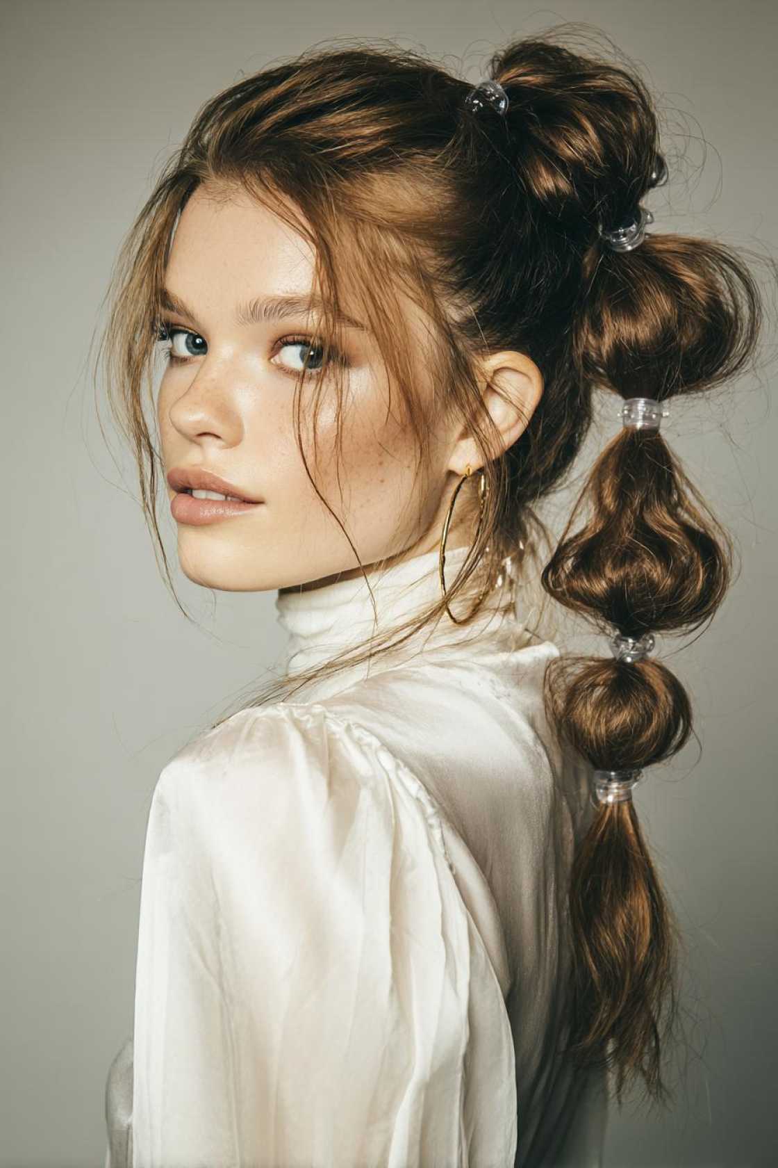 15+ Show-Stopping-Party-Pony-Hairstyles-to-Elevate-Your-Next-Night-Out.-14.-The-Bubble-Pony