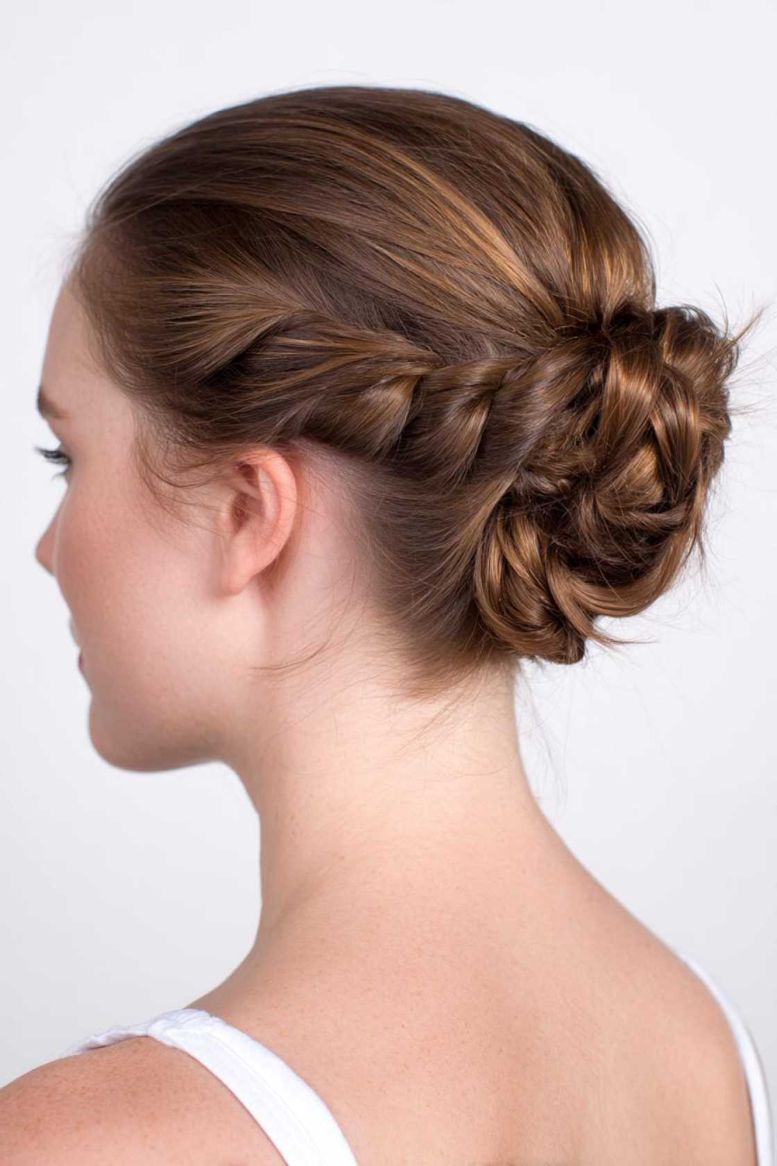 Beyond the Messy Bun: 20+ Creative & Secure Hairstyle Ideas for the Gym. - 12. Braided Bun