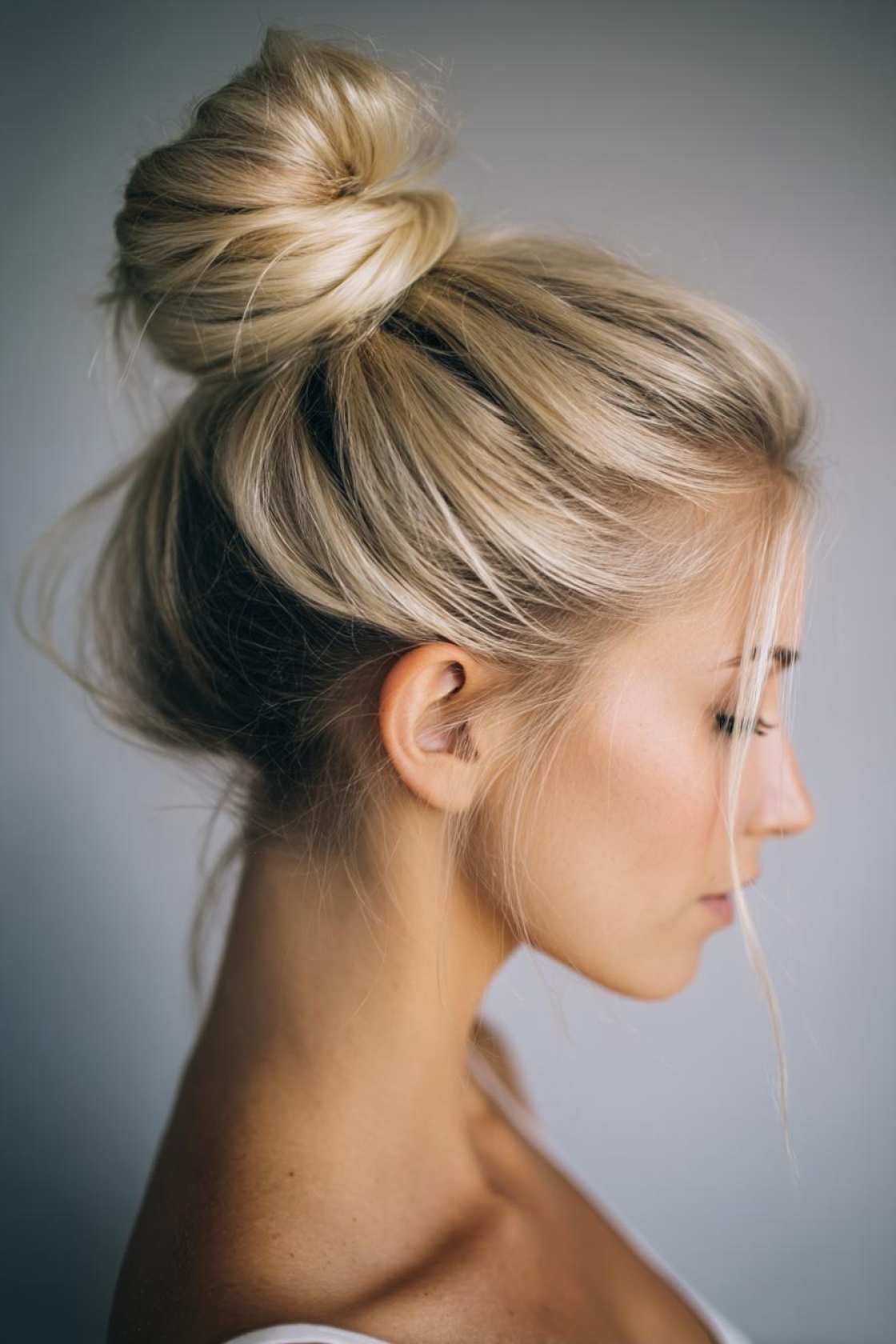 Beyond the Messy Bun: 20+ Creative & Secure Hairstyle Ideas for the Gym. - 11. High Bun