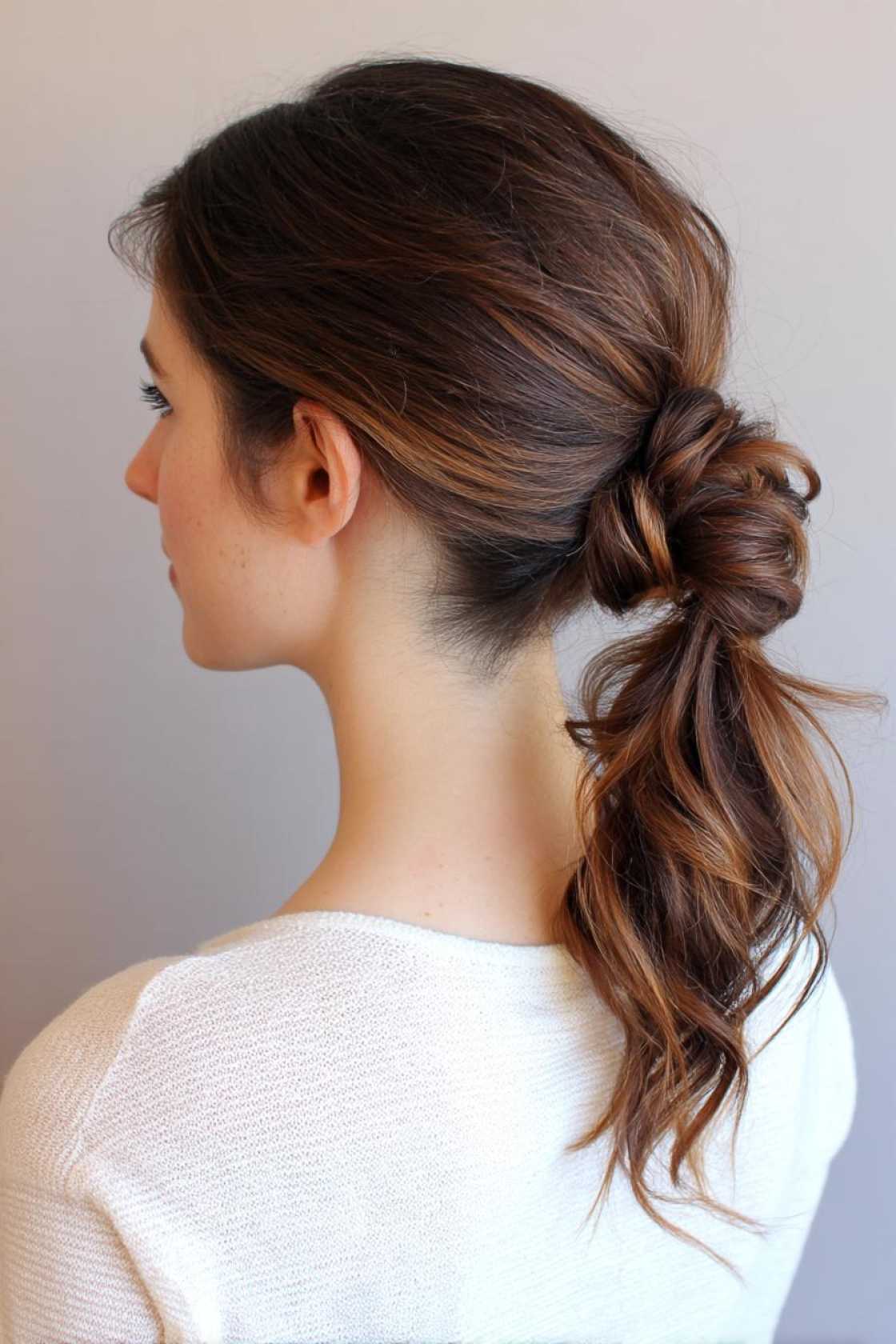 Beyond the Messy Bun: 20+ Creative & Secure Hairstyle Ideas for the Gym. - 8. Twisted Ponytail
