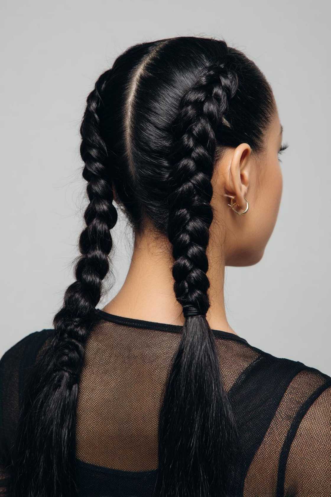 Beyond the Messy Bun: 20+ Creative & Secure Hairstyle Ideas for the Gym. - 2. Braided Pigtails
