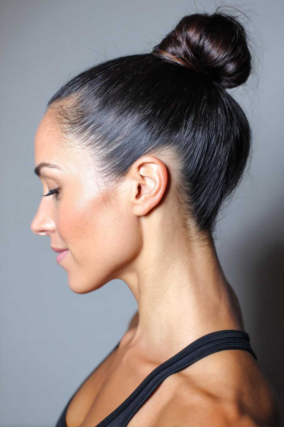 Beyond the Messy Bun: 20+ Creative & Secure Hairstyle Ideas for the Gym. - 1. Sleek Bun