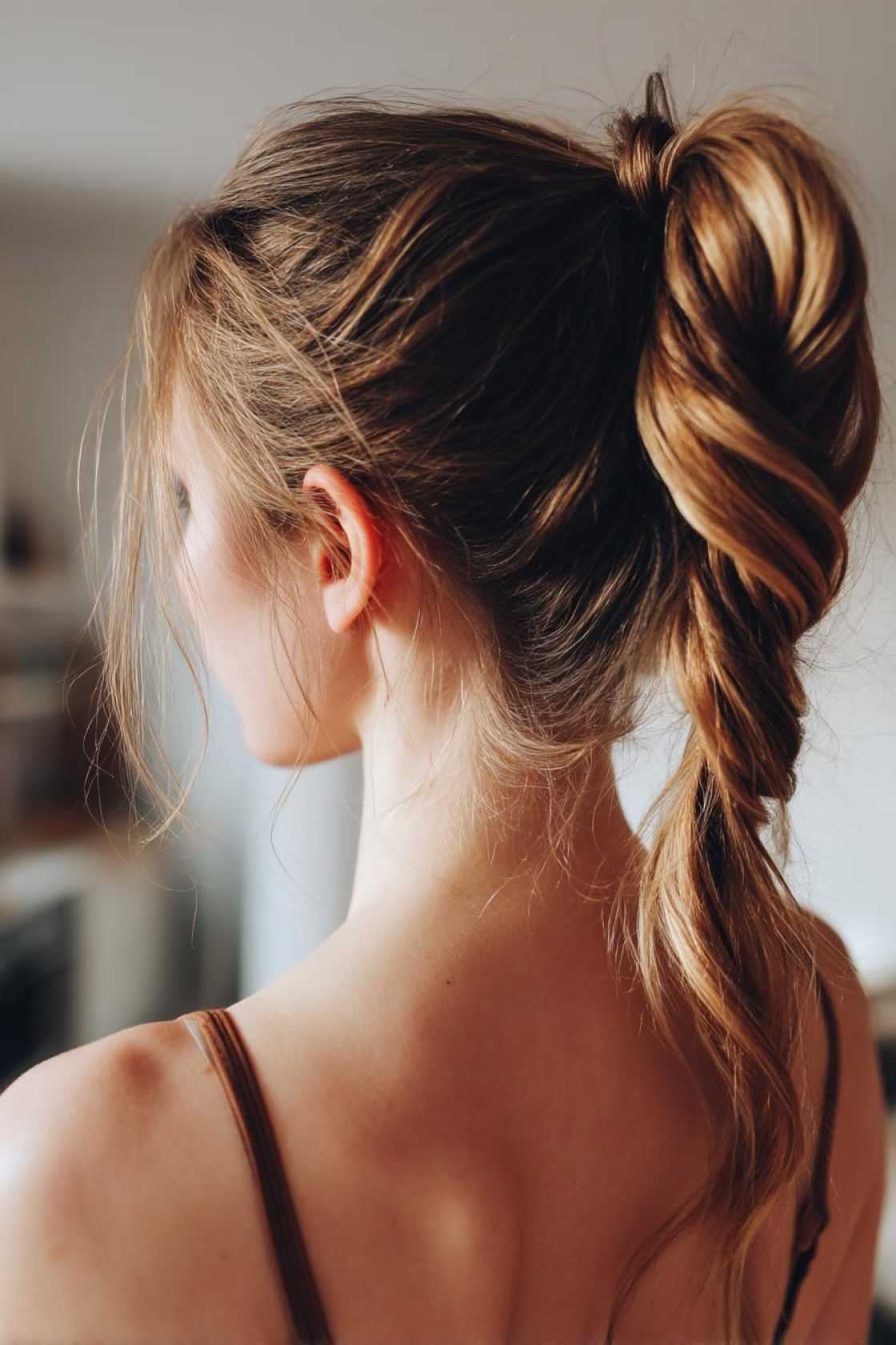 Court-Ready & Cute: 18+ Easy Basketball Hairstyles You Can Do in Minutes. - 4. Twisted Ponytail