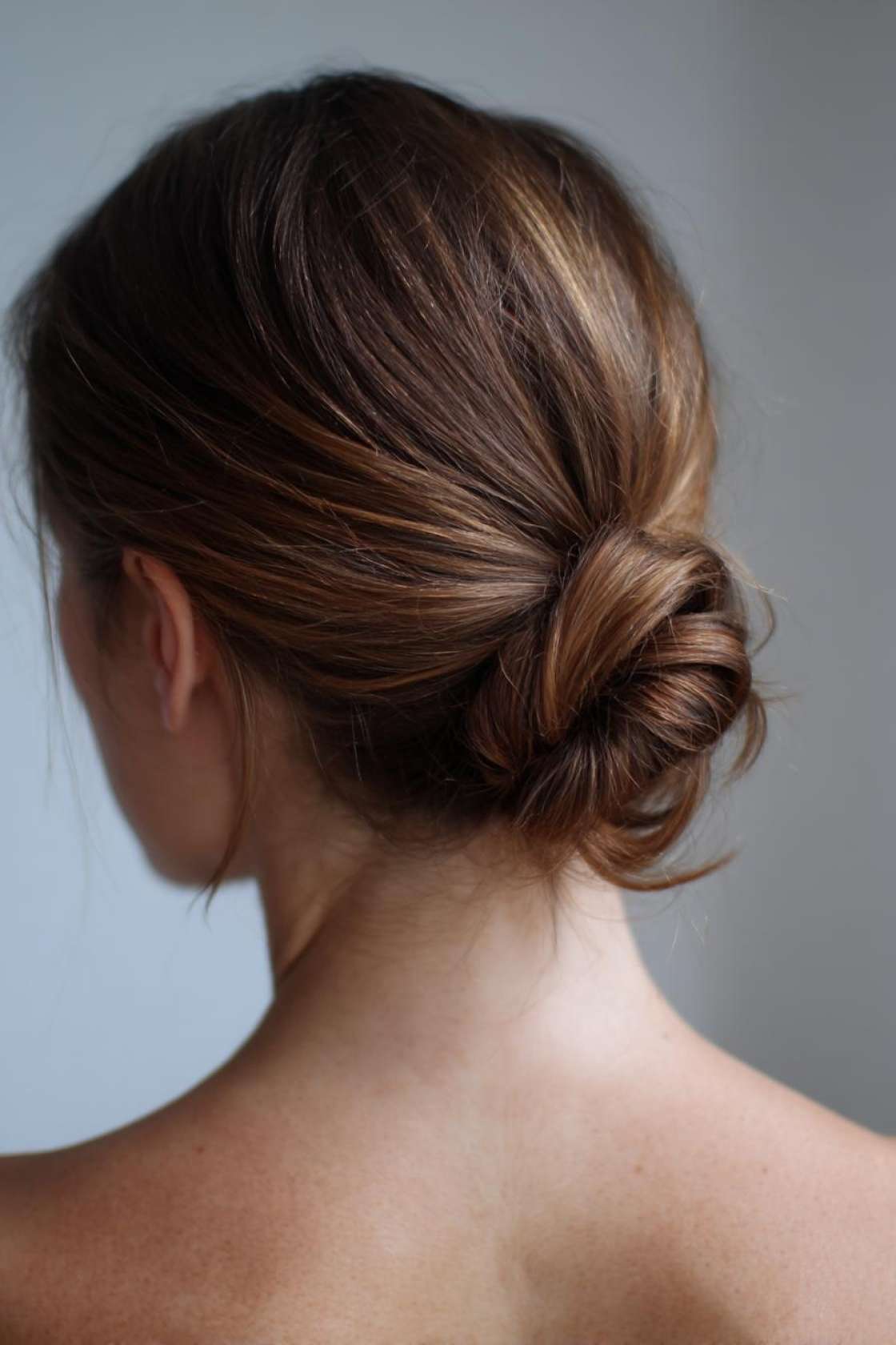 Crush Your Goals: 12+ Easy & Stylish Workout Hairstyles (5 Minutes or Less!). - 13. The Low Bun