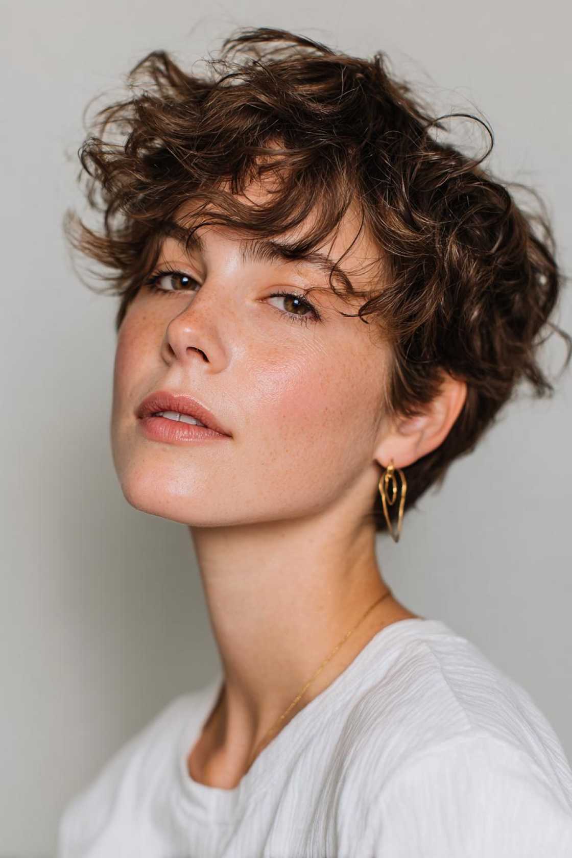 Effortlessly Cool: 10+ Reasons to Rock a 90s-Inspired Pixie Haircut. - 7. The Wavy Pixie