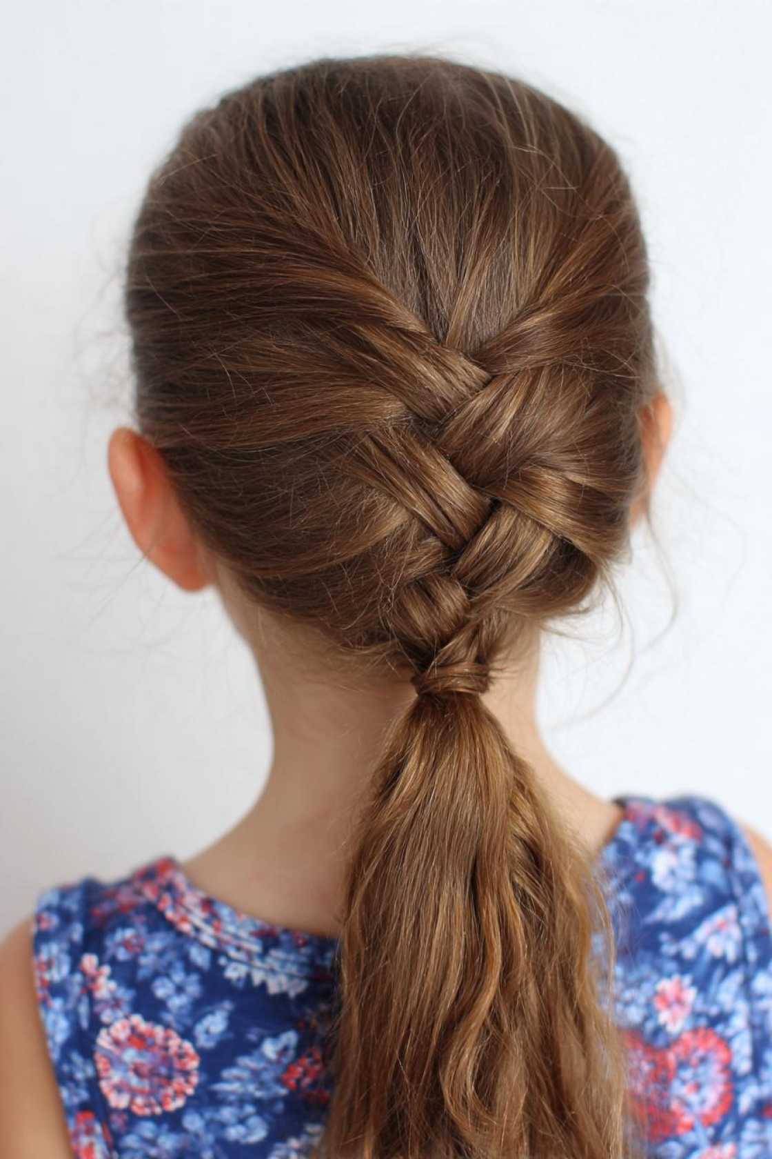 First Day Fresh: 20+ Cute & Quick Back to School Hairstyles Kids Will Love. - 9. Criss-Cross Ponytail