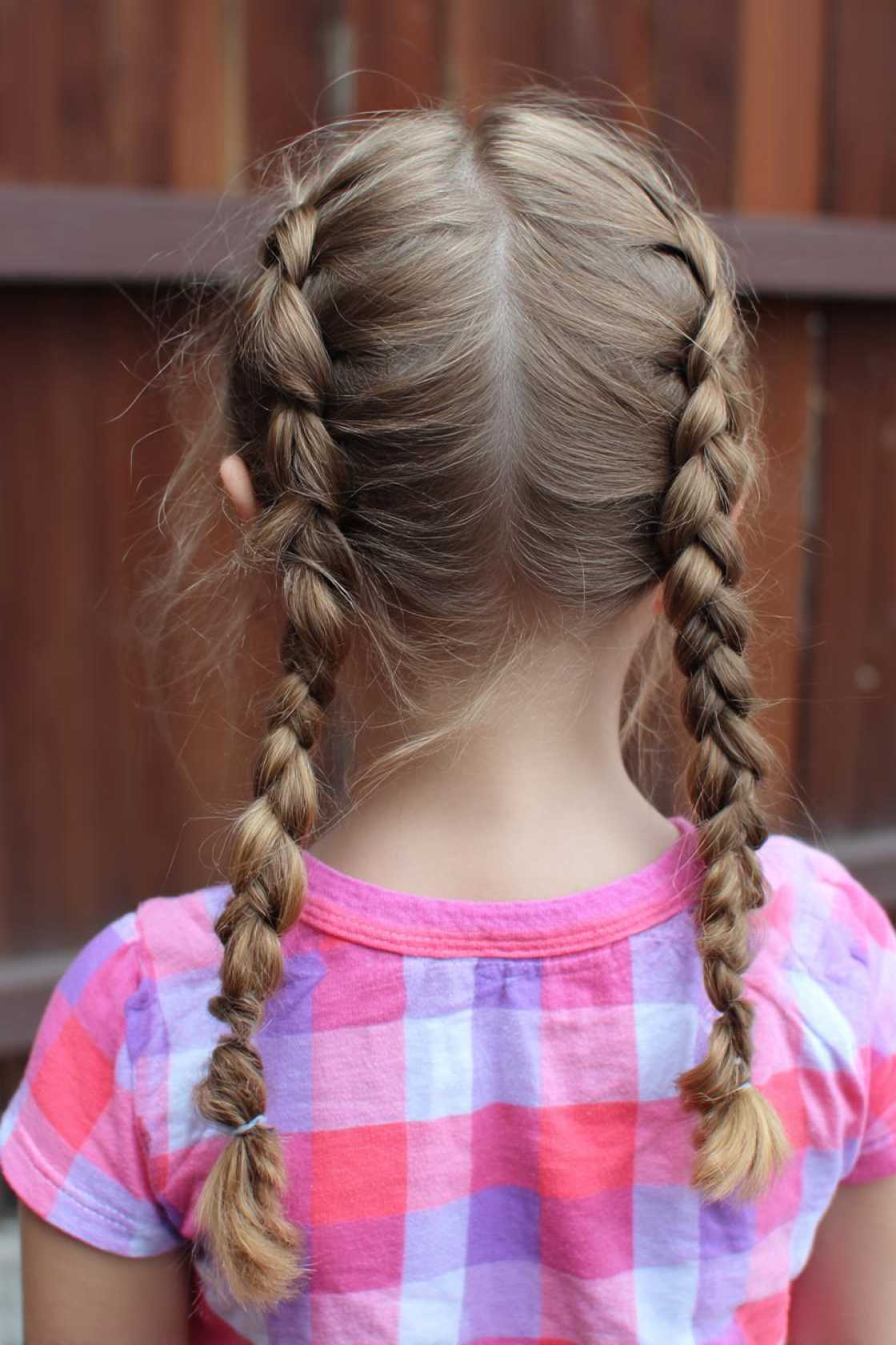 First Day Fresh: 20+ Cute & Quick Back to School Hairstyles Kids Will Love. - 18. Twisted Pigtails
