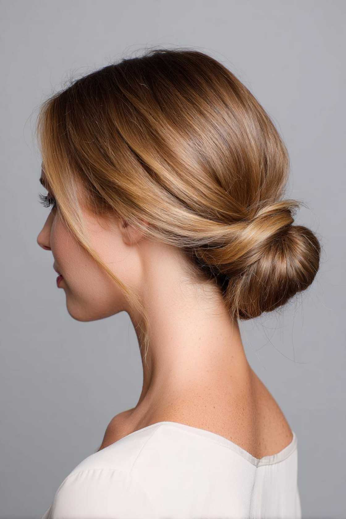 Game On! 20+ Volleyball Hairstyles That Stay Put Through Every Dive & Jump. - 20. Low Bun
