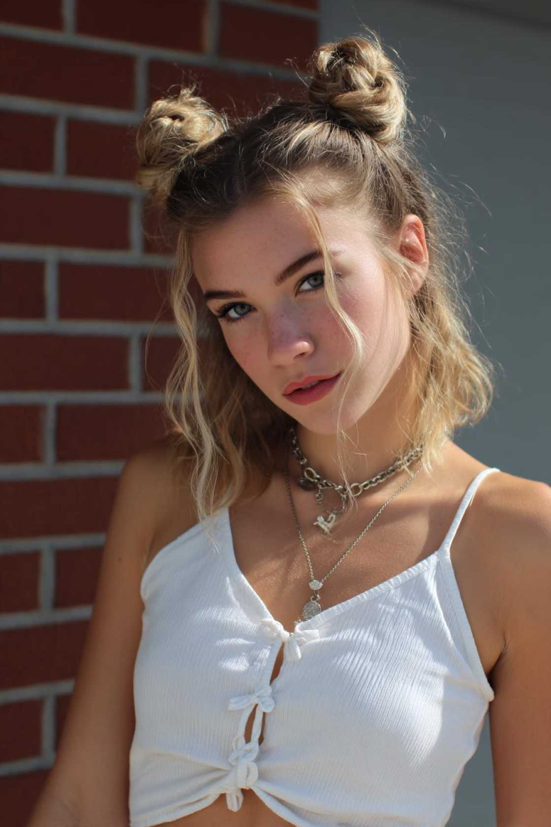 Get Your Boots On! 20+ Cute Country Hairstyles Perfect for Concerts & Festivals. - 16. Space Buns