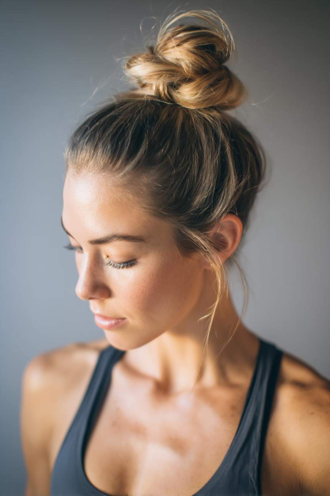 Gym Hair Heroes: 12+ Hairstyles That Won't Budge, No Matter the Exercise. - 9. The Half-Up Bun