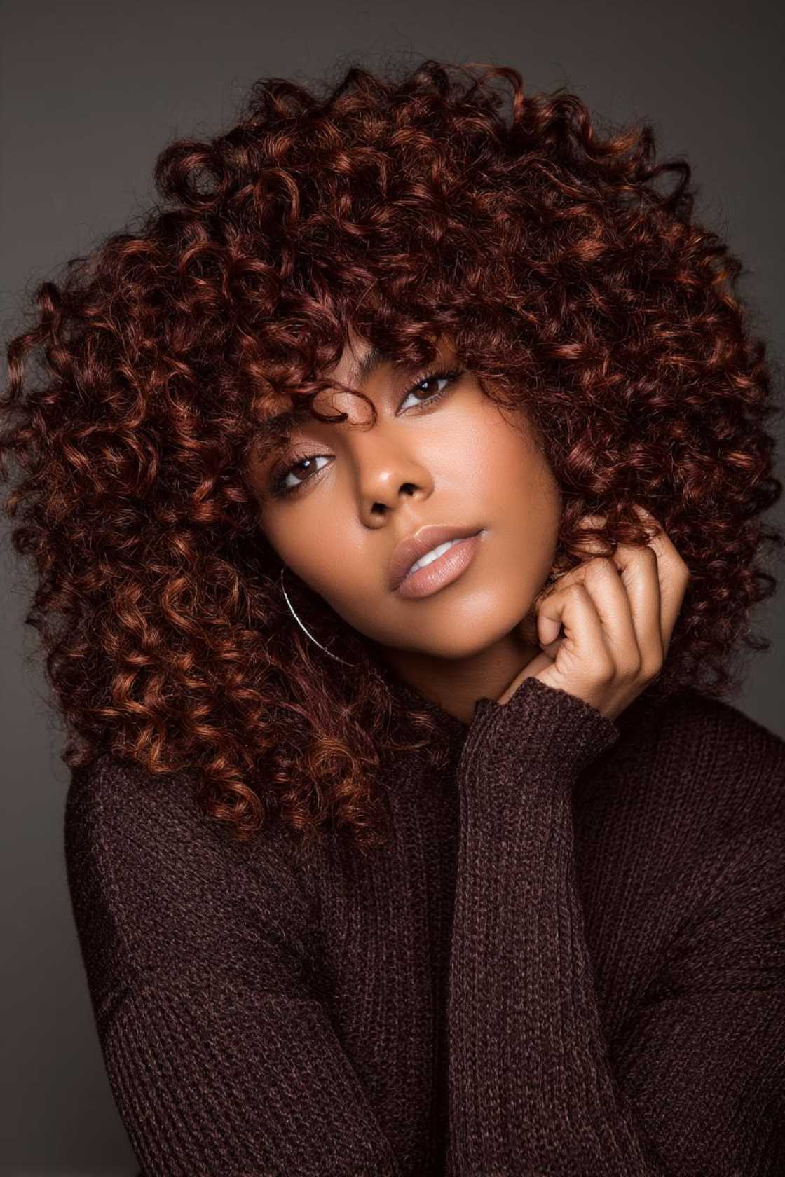 Is Chocolate Cherry Hair Right for You? Inspiration for Every Skin Tone - 13. Chocolate Cherry on Curly Hair