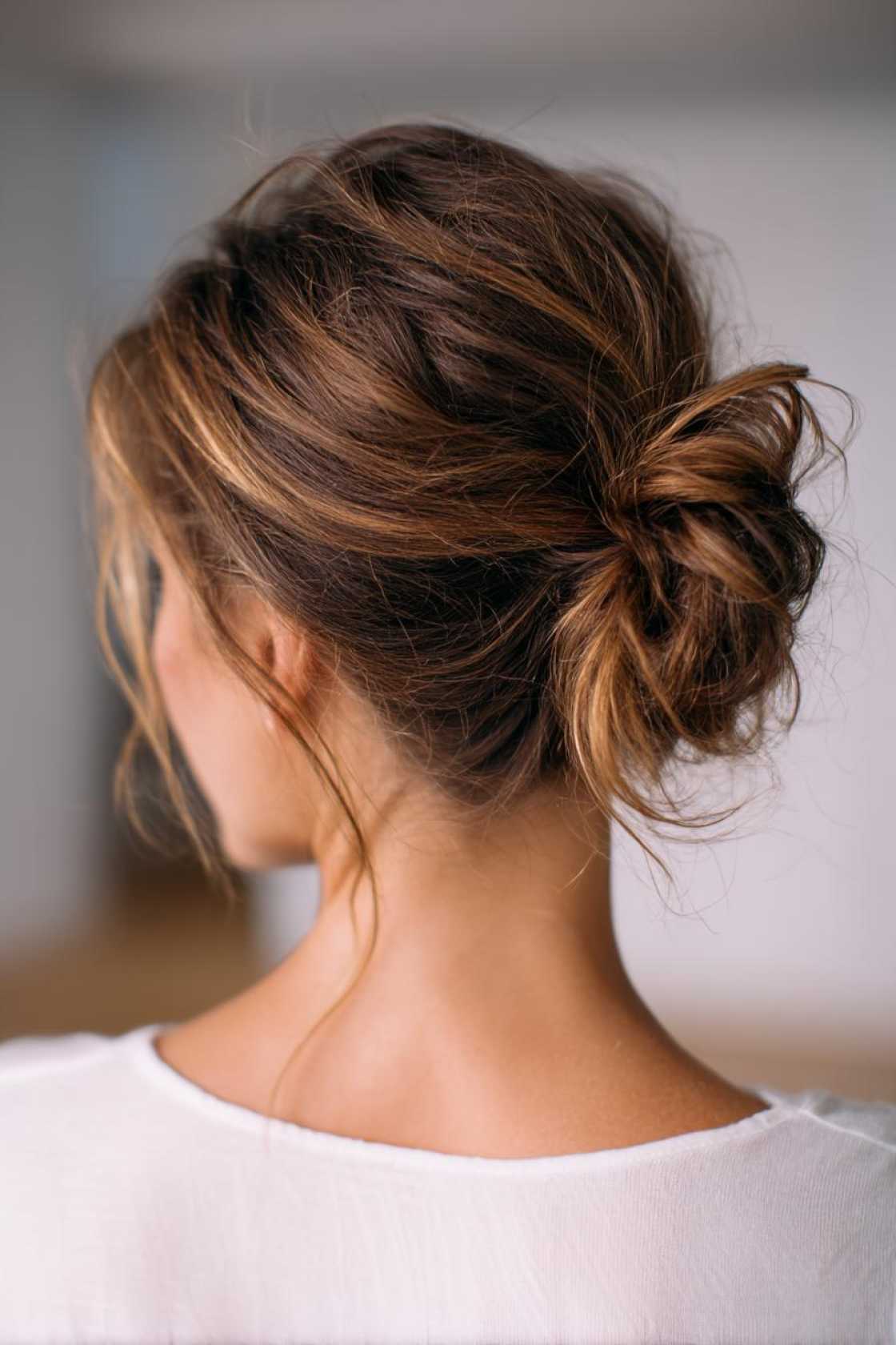 No-Fuss Fitness Hair: 18+ Easy Gym Hairstyles to Keep You Focused & Cool. - 4. Messy Bun