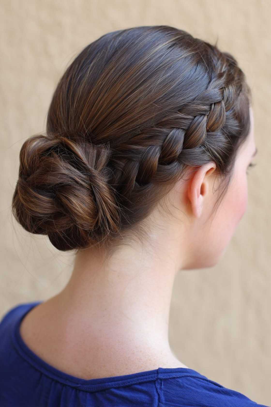 No Sweat! 12+ Basketball Hairstyles Designed to Keep Hair Off Your Face & Neck. - 8. Braided Bun