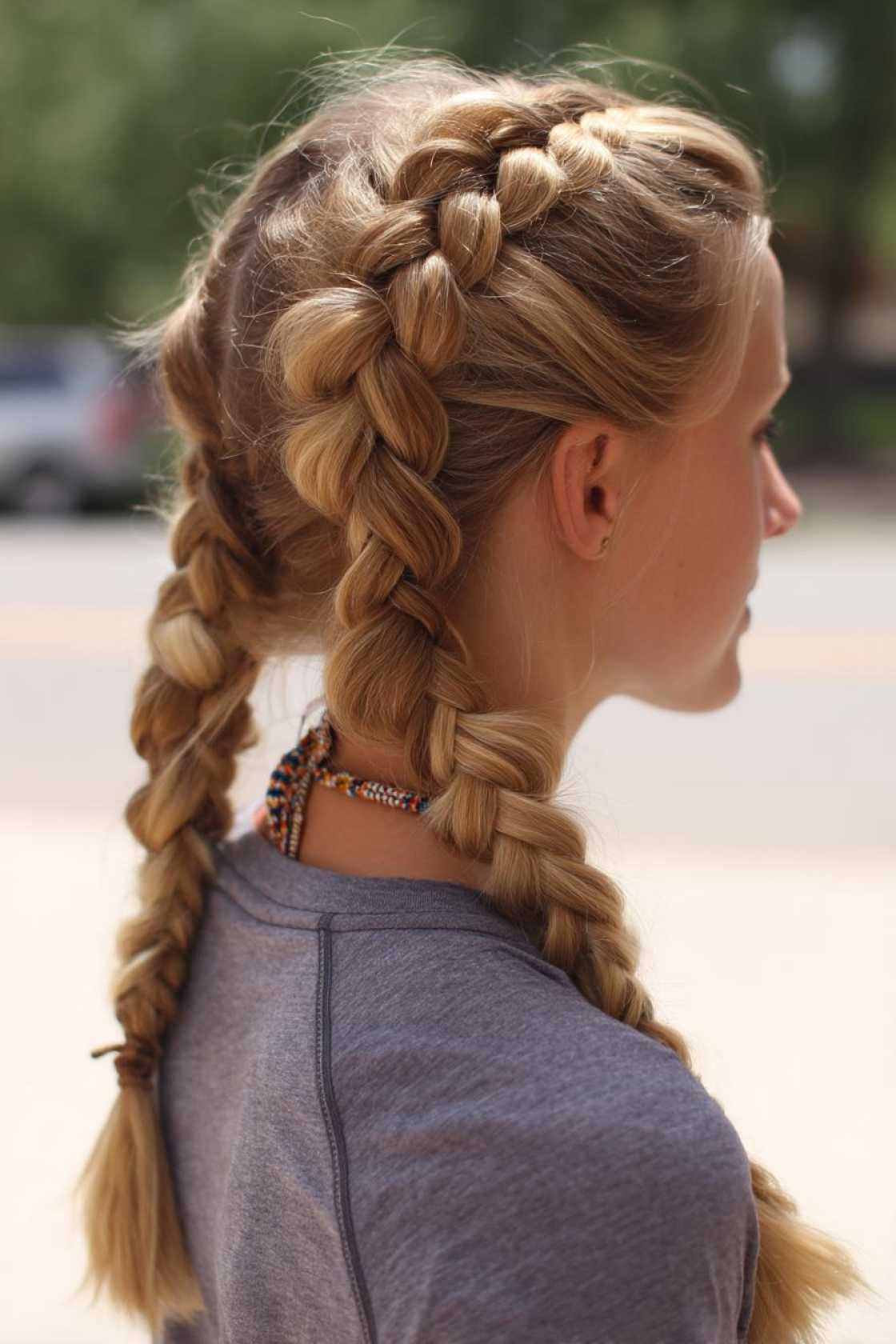 The Ultimate Gym Hair Guide: 12+ Hairstyles That Stay Put (Cardio to Weights). - 5. Two Dutch Braids