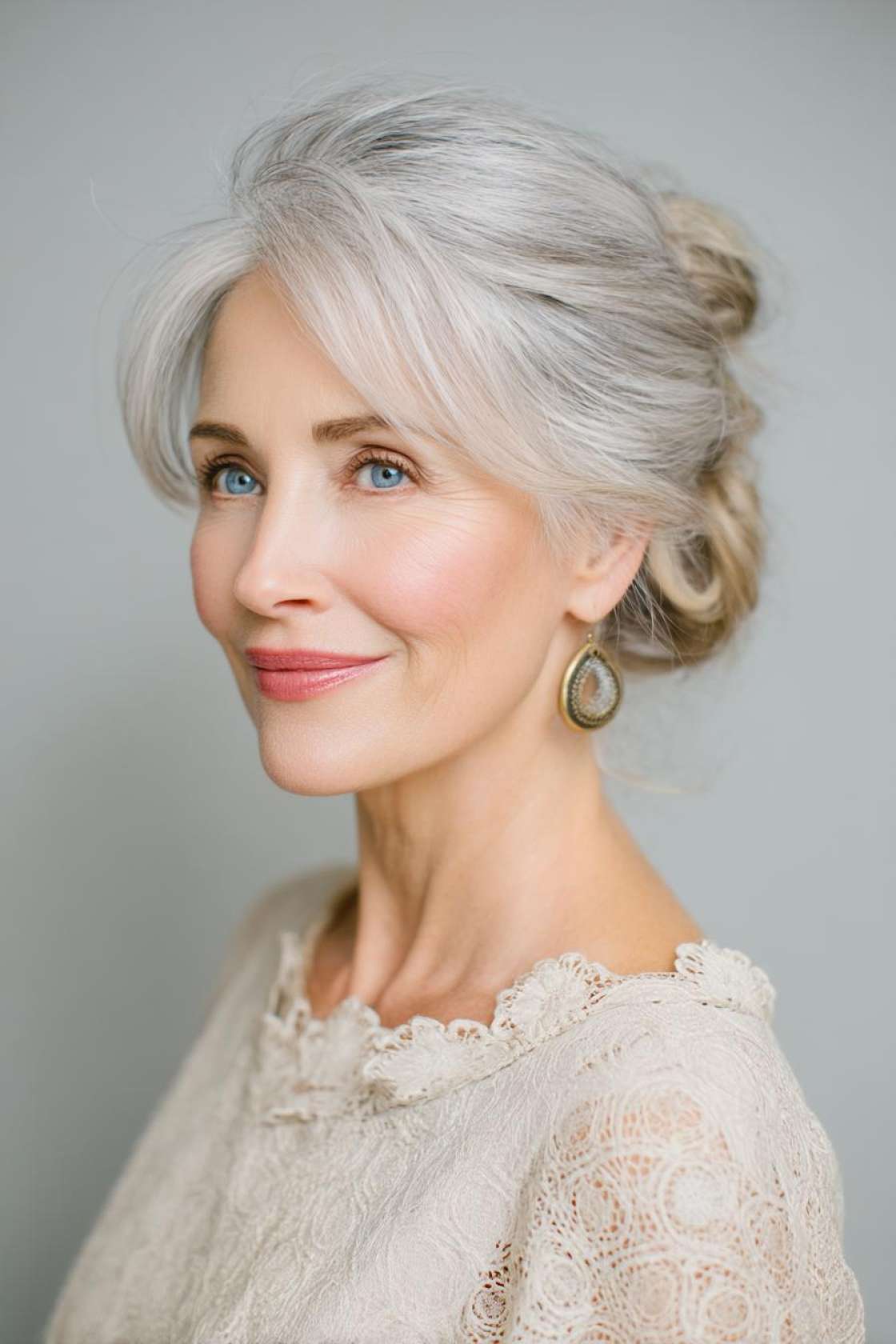 Timeless Beauty: 12+ Graceful Hairstyles for the Mother of the Groom. - 13. Romantic Updo with Loose Strands