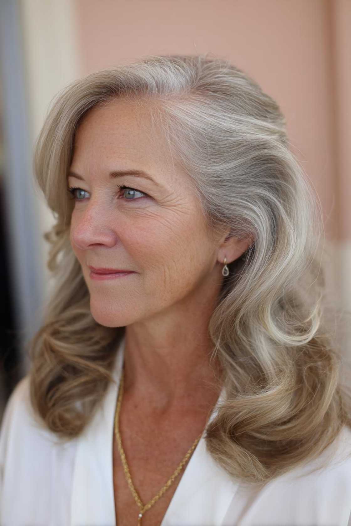 Timeless Beauty: 12+ Graceful Hairstyles for the Mother of the Groom. - 11. Soft Waves with Side Sweep