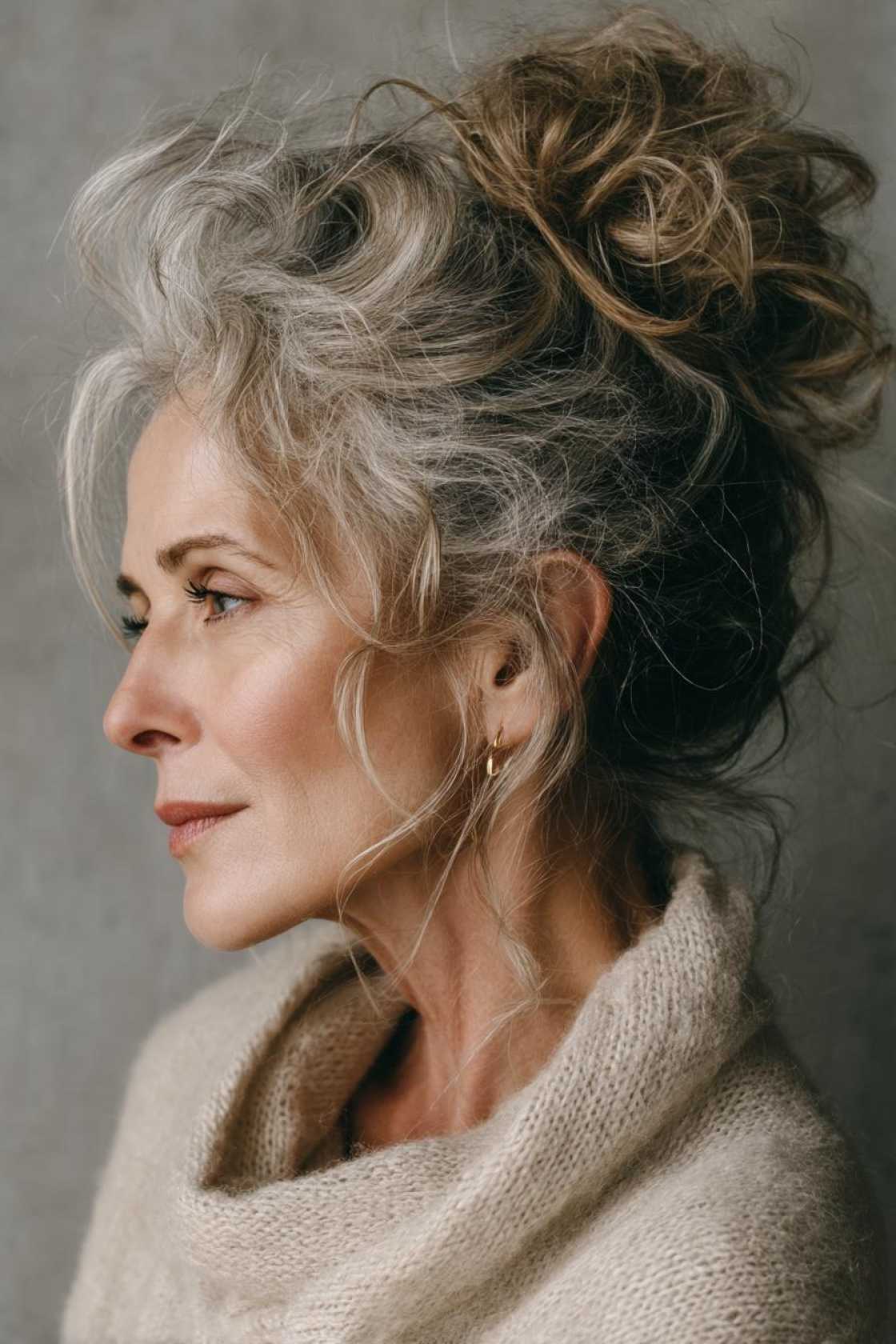 Wedding Day Glam: 20+ Stunning Hairstyle Inspirations for the Mother of the Groom. - 13. Messy Bun with Tendrils