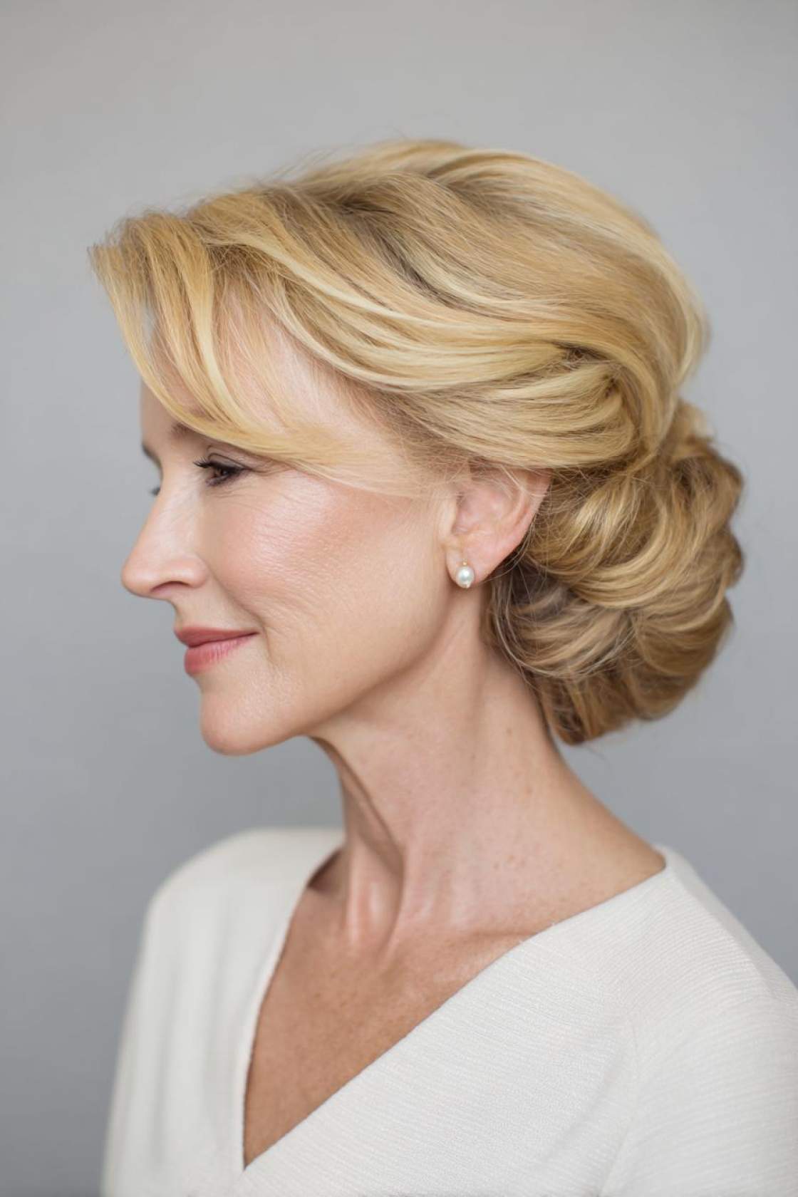 Wedding Day Glam: 20+ Stunning Hairstyle Inspirations for the Mother of the Groom. - 20. Classic French Twist