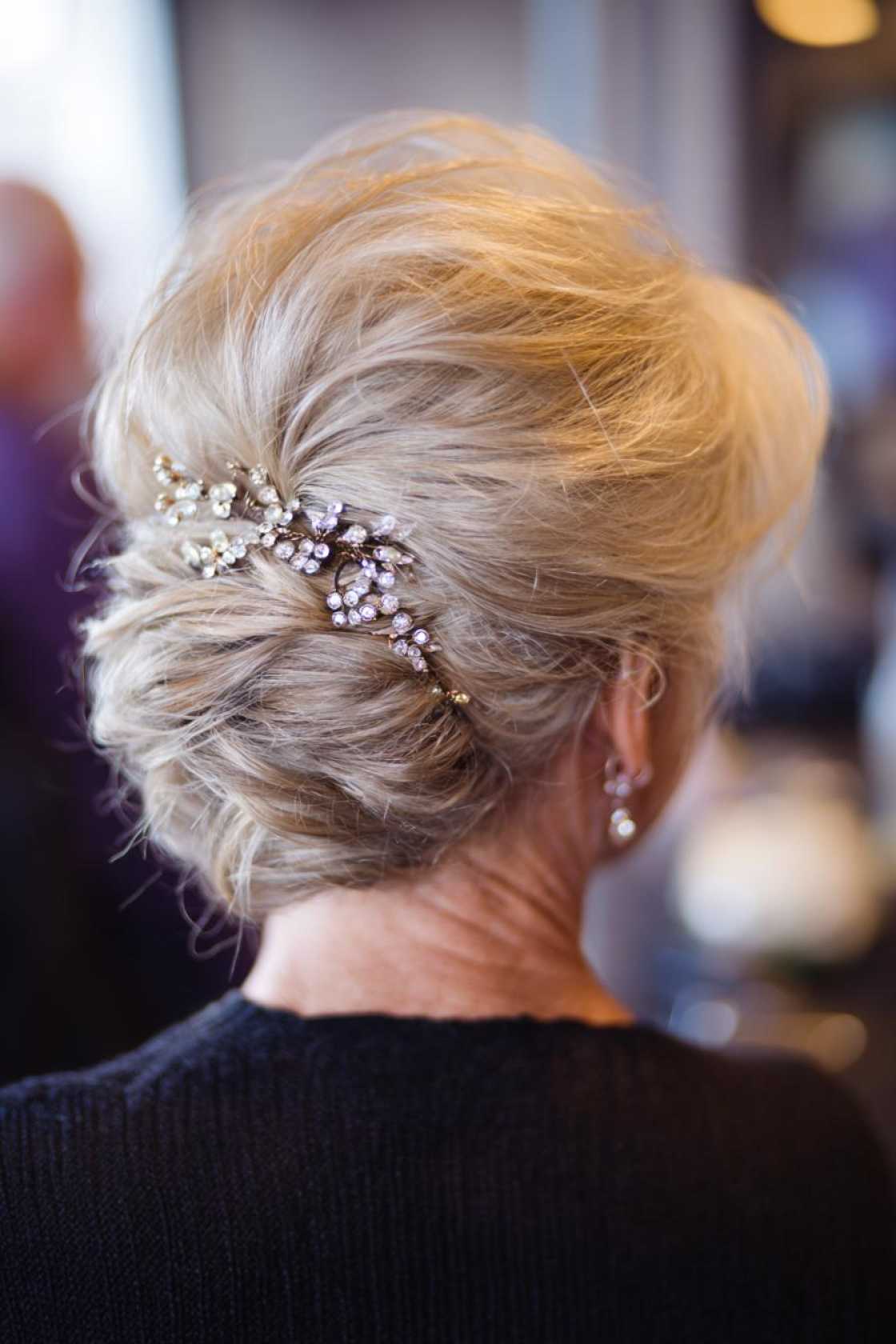 Age Beautifully, Celebrate Joyfully: 15+ Flattering Hairstyles for the Mother of the Groom. - 6. Updo with Embellishments