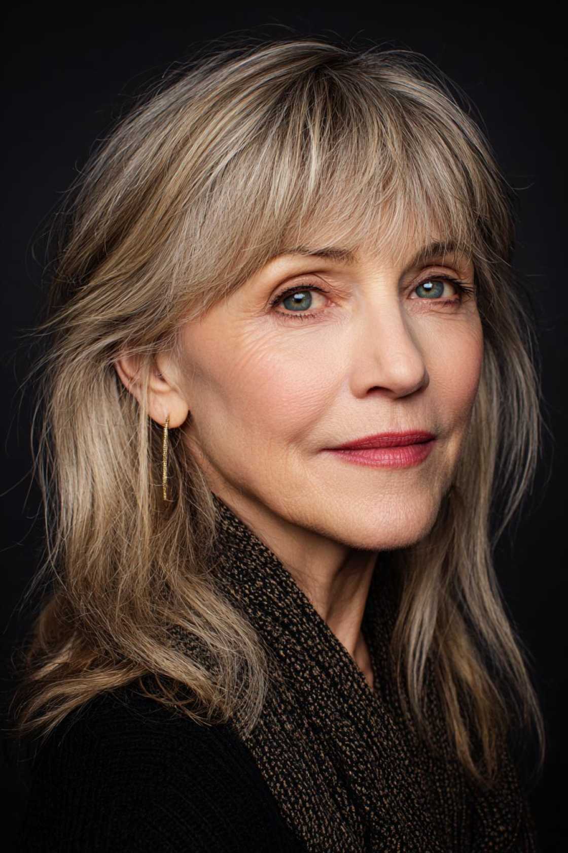 Age Beautifully, Celebrate Joyfully: 15+ Flattering Hairstyles for the Mother of the Groom. - 3. Wispy Bangs with Long Layers
