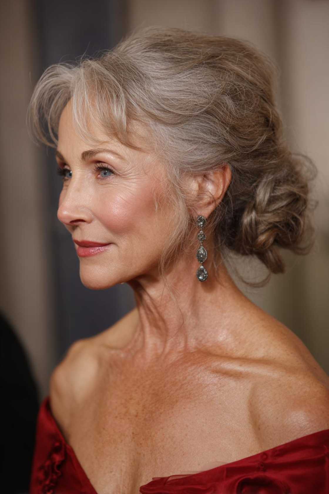 Age-Gracefully & Beautifully: 15+ Flattering Hairstyles for the Mother of the Bride. - 15. Classic Updo with Soft Tendrils