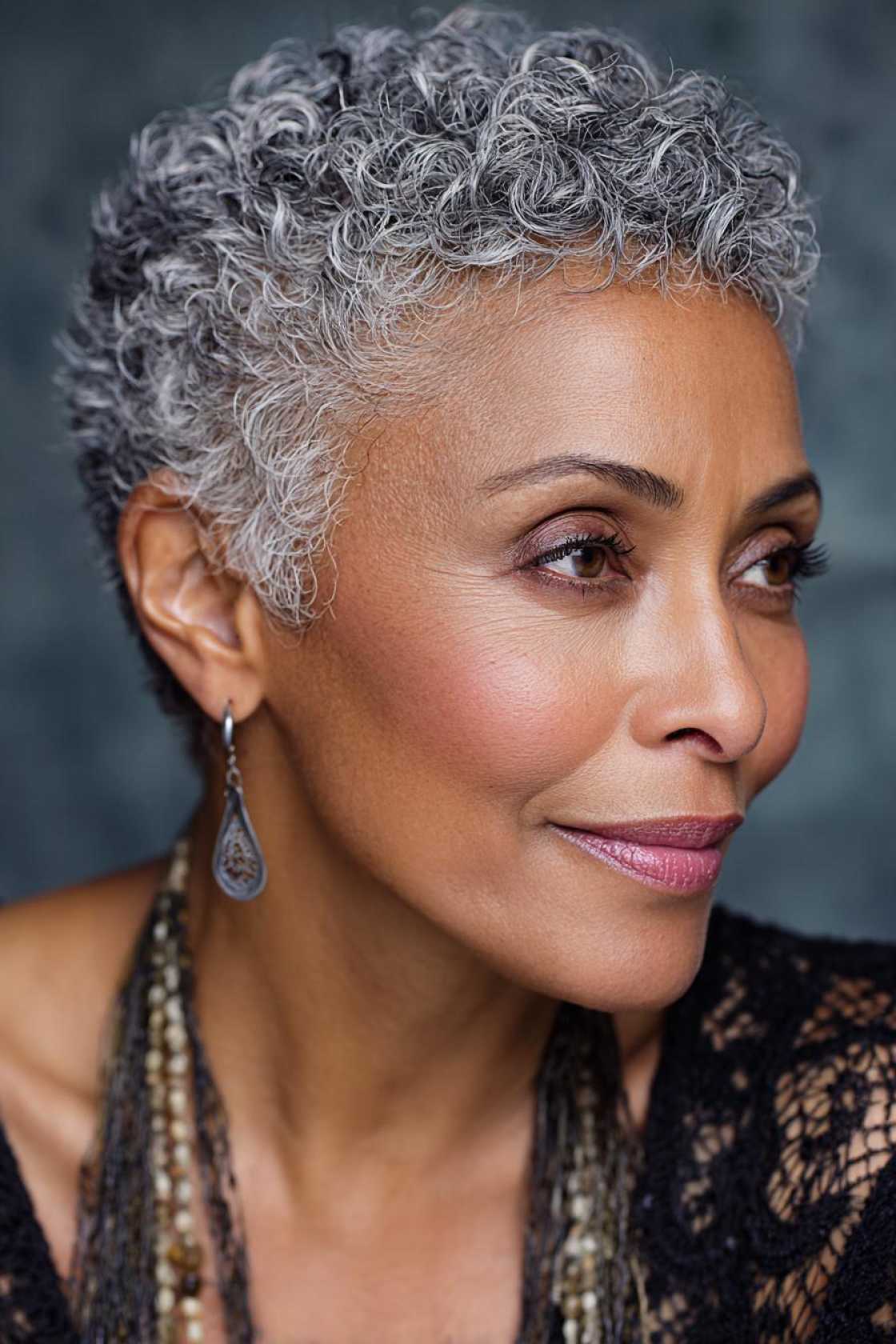 Ageless Curls: 20+ Chic & Modern Curly Hairstyle Ideas for Women Over 50. - 7. The Tapered Cut