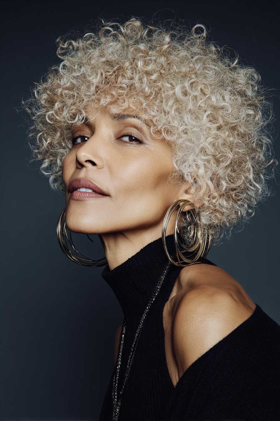 Ageless Curls: 20+ Chic & Modern Curly Hairstyle Ideas for Women Over 50. - 4. The Curly Bowl Cut