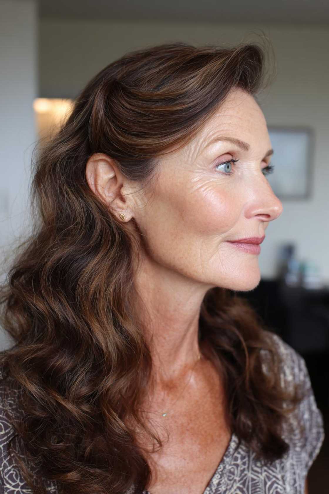 Ageless Curls: 20+ Chic & Modern Curly Hairstyle Ideas for Women Over 50. - 19. The Voluminous Side Part