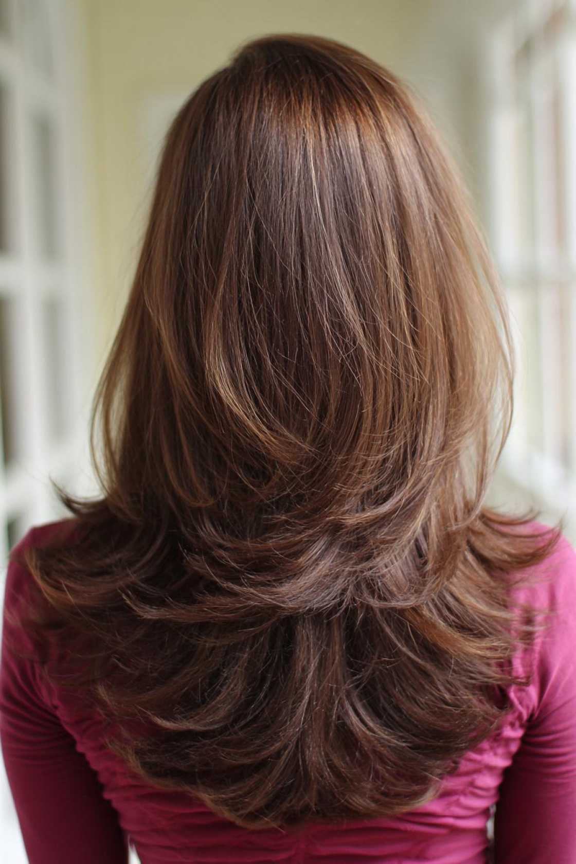 Catch the Retro Wave: 15+ Iconic 70s Hairstyles Making a Totally Groovy Comeback. - 16. The Feathered Flip