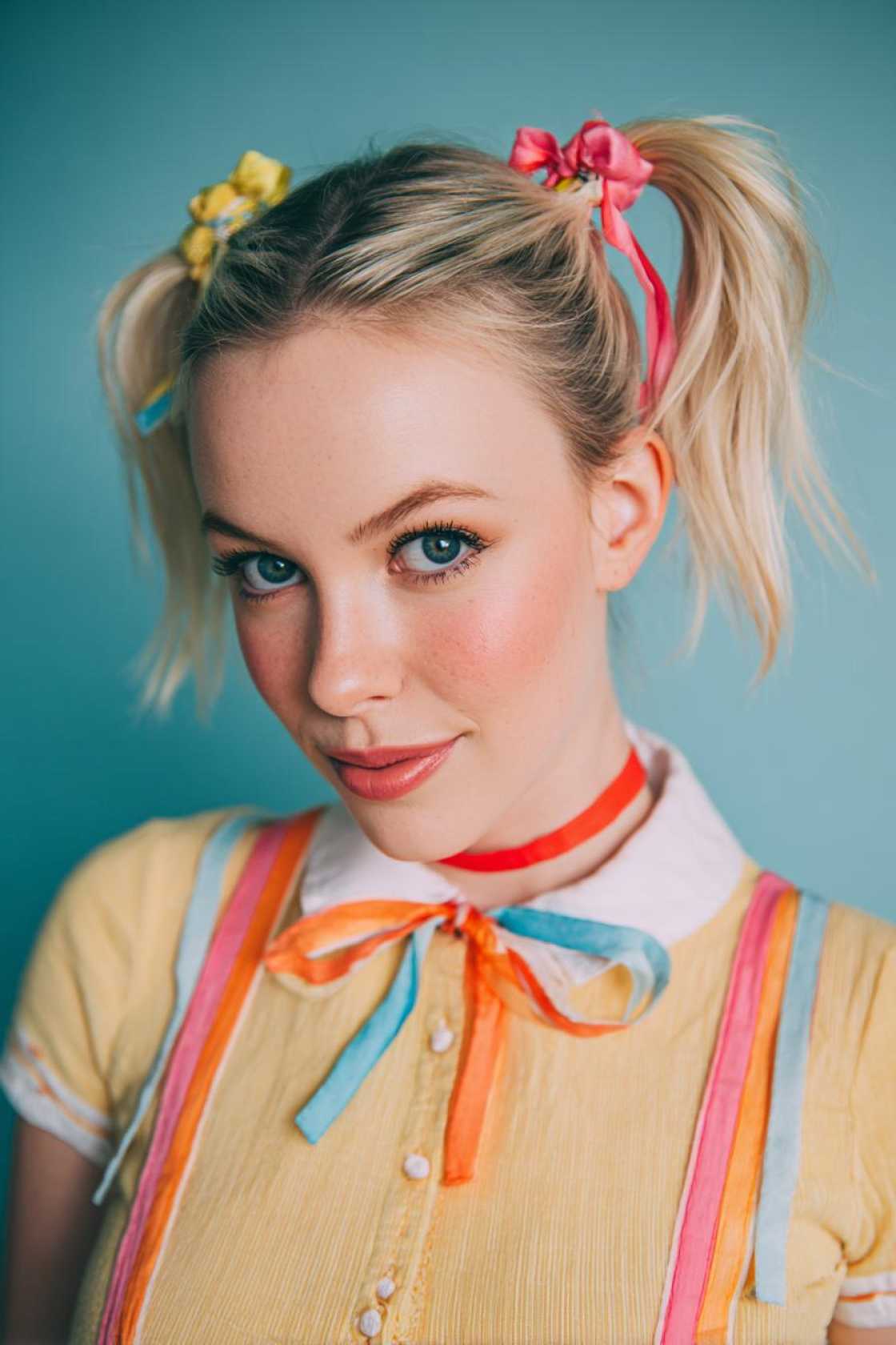 Catch the Retro Wave: 15+ Iconic 70s Hairstyles Making a Totally Groovy Comeback. - 7. Pigtails with Ribbons