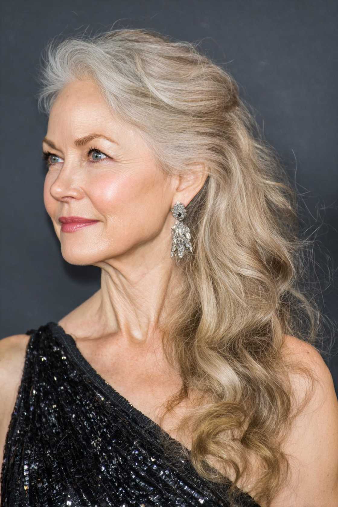 Classy Choices: 12+ Mother of the Groom Hairstyles (Updos, Bobs & Graceful Waves). - Elegant Side Swept Waves