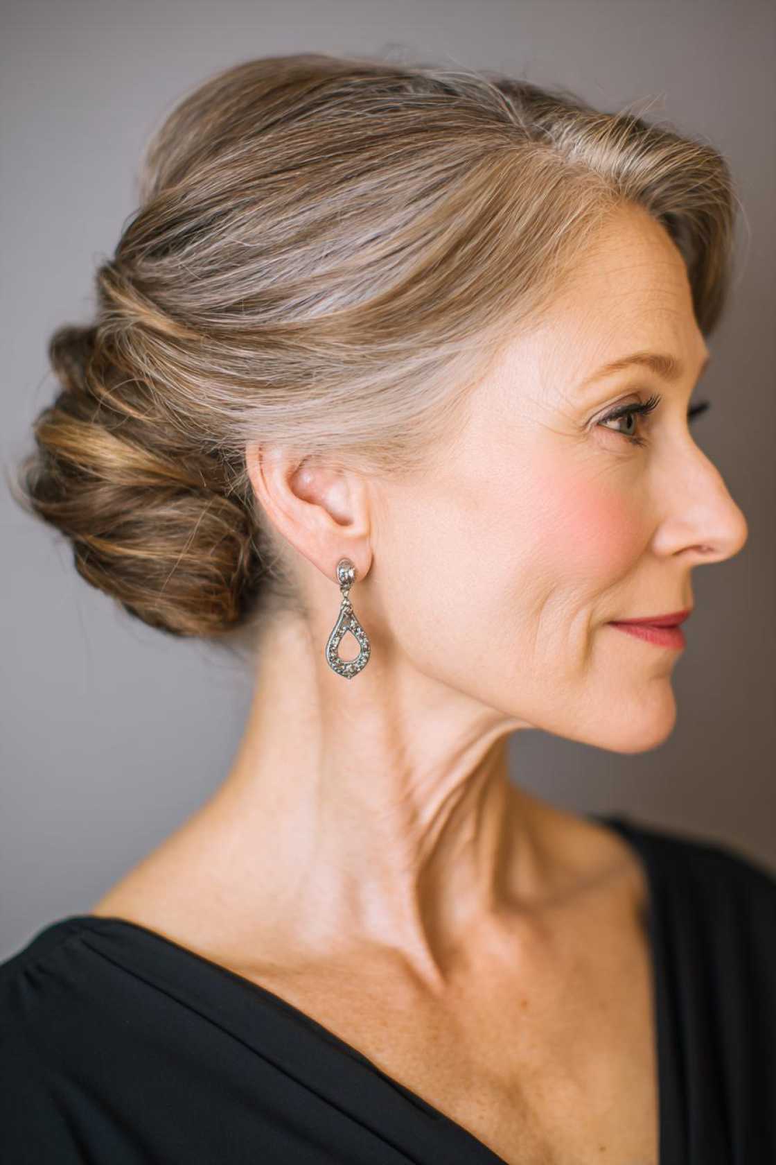 Classy Choices: 12+ Mother of the Groom Hairstyles (Updos, Bobs & Graceful Waves). - Classic French Twist